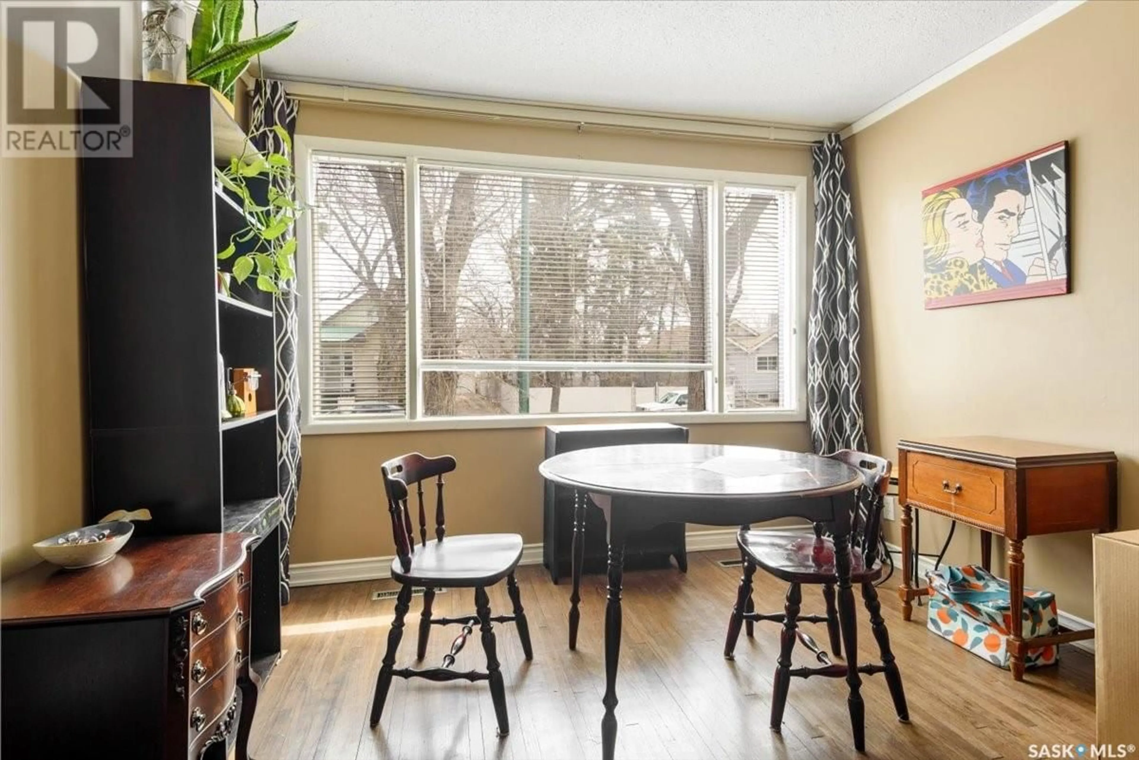 Dining room, wood/laminate floor for 2212 WINNIPEG STREET, Regina Saskatchewan S4P1H1