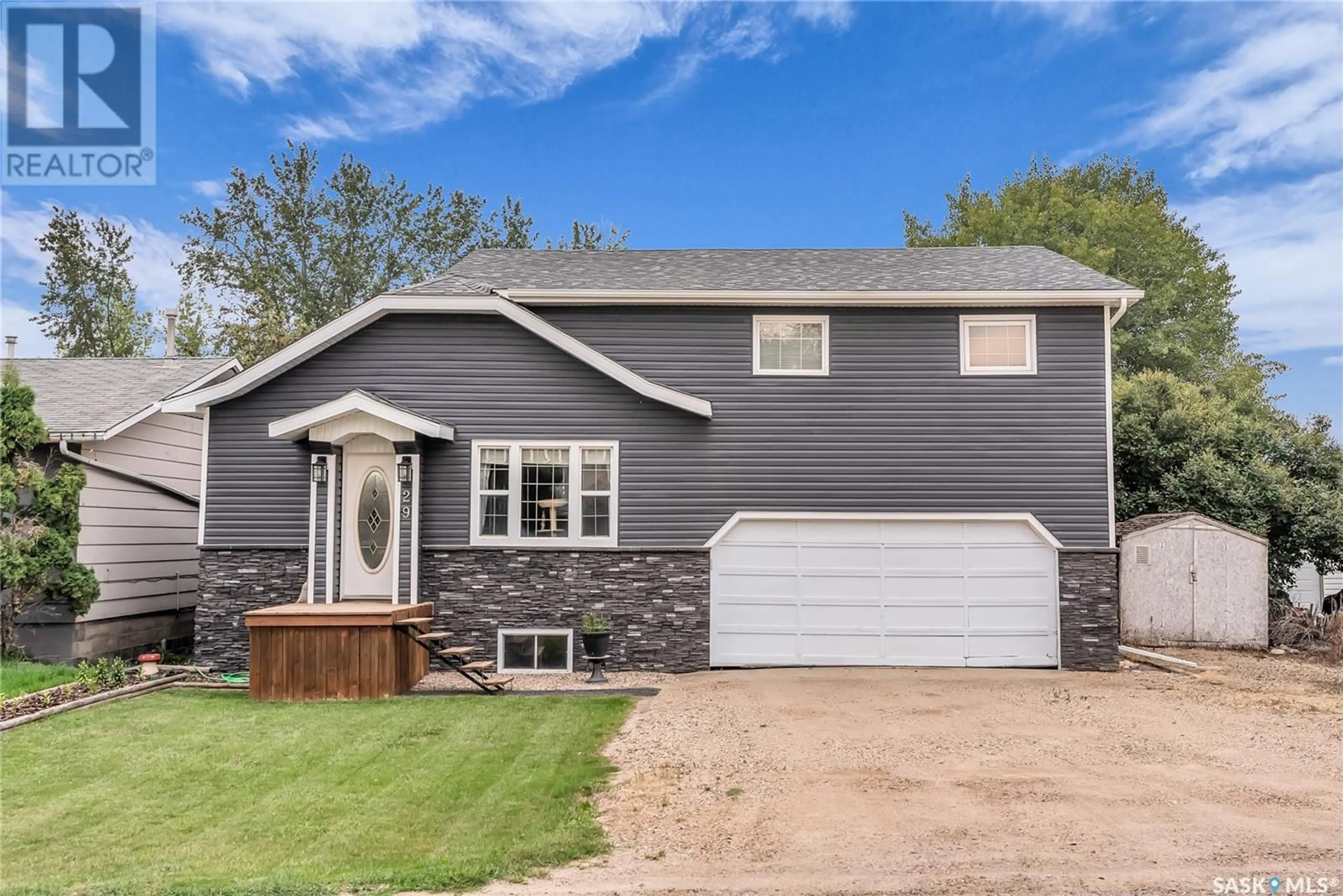 Home with vinyl exterior material, street for 29 MAIN STREET, Clavet Saskatchewan S0K0Y0