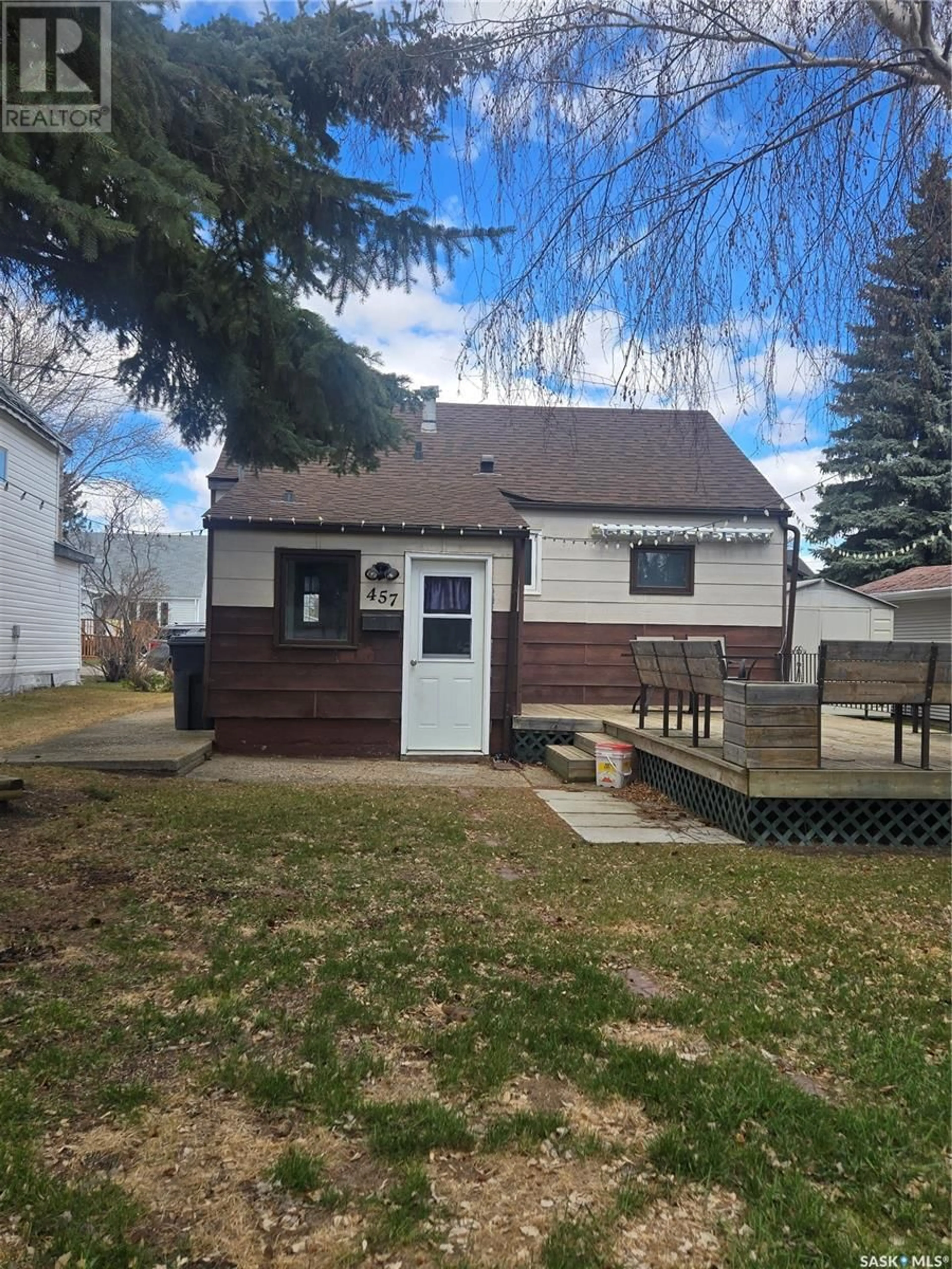 Home with vinyl exterior material, street for E - 457 THIRD AVENUE, Melville Saskatchewan S0A2P0