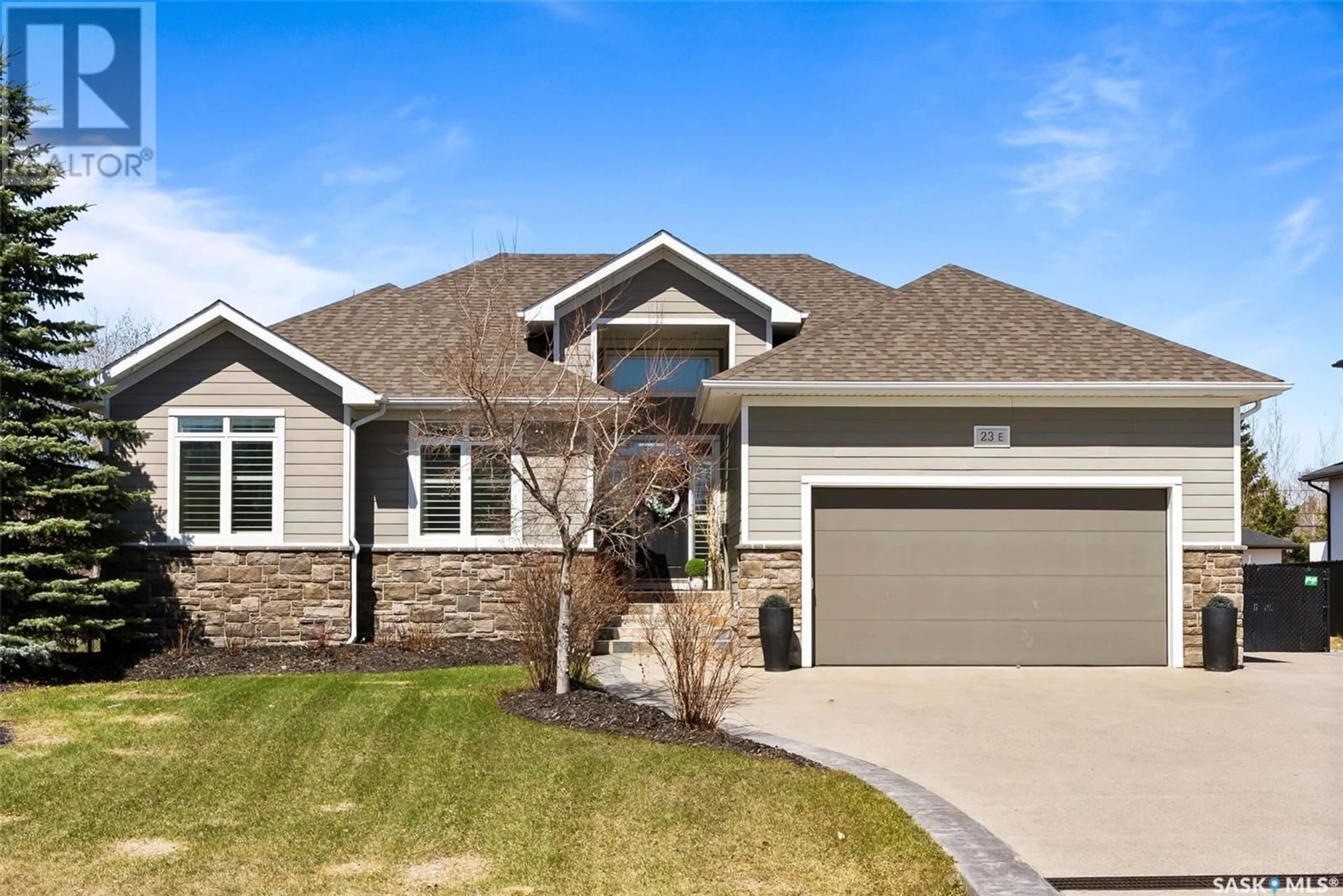 Home with brick exterior material, street for 23 LOTT ROAD, White City Saskatchewan S4L0B7