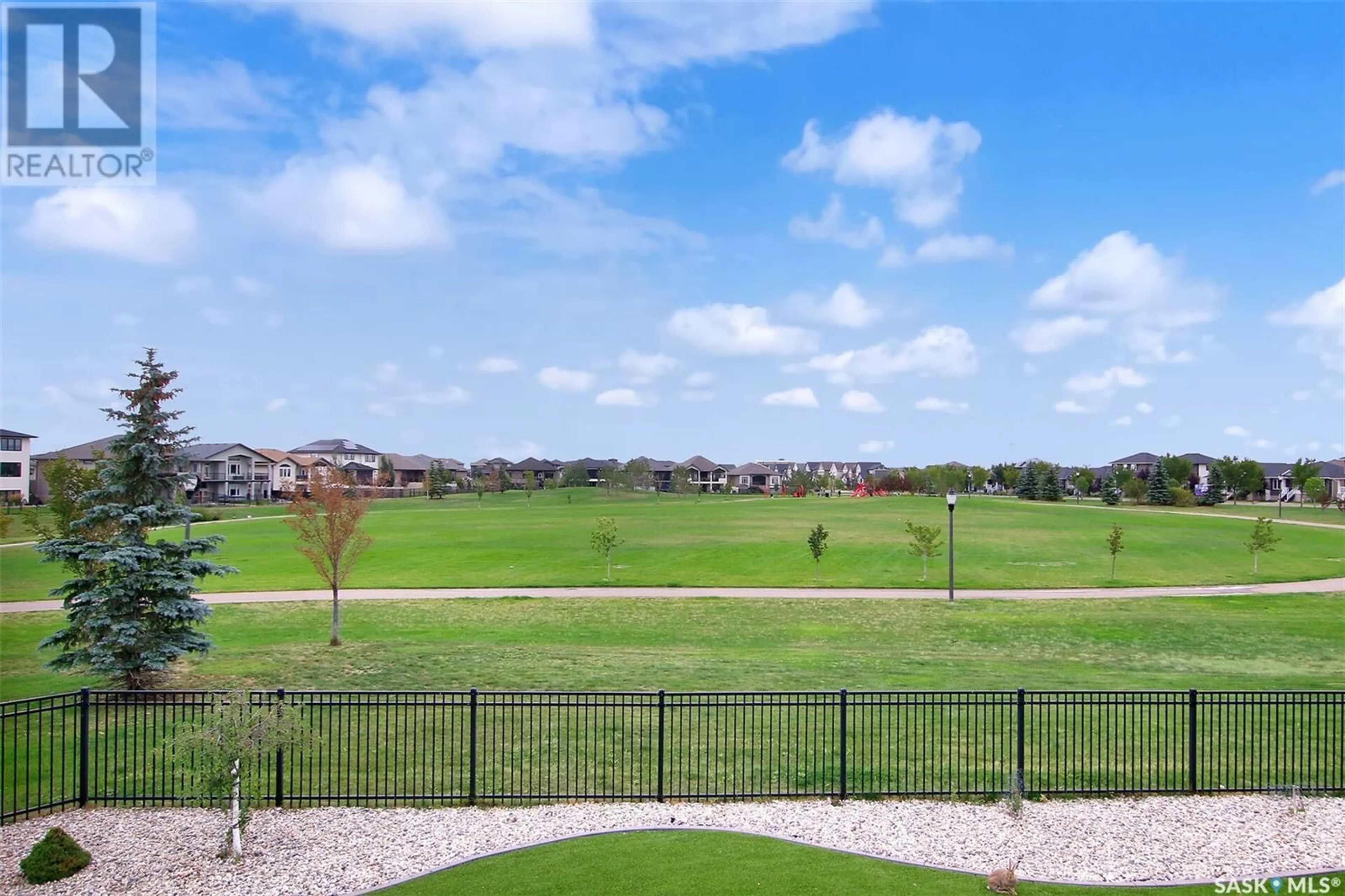 A pic from outside/outdoor area/front of a property/back of a property/a pic from drone, water/lake/river/ocean view for E - 4224 GREEN ROSE CRESCENT, Regina Saskatchewan S4V1M6