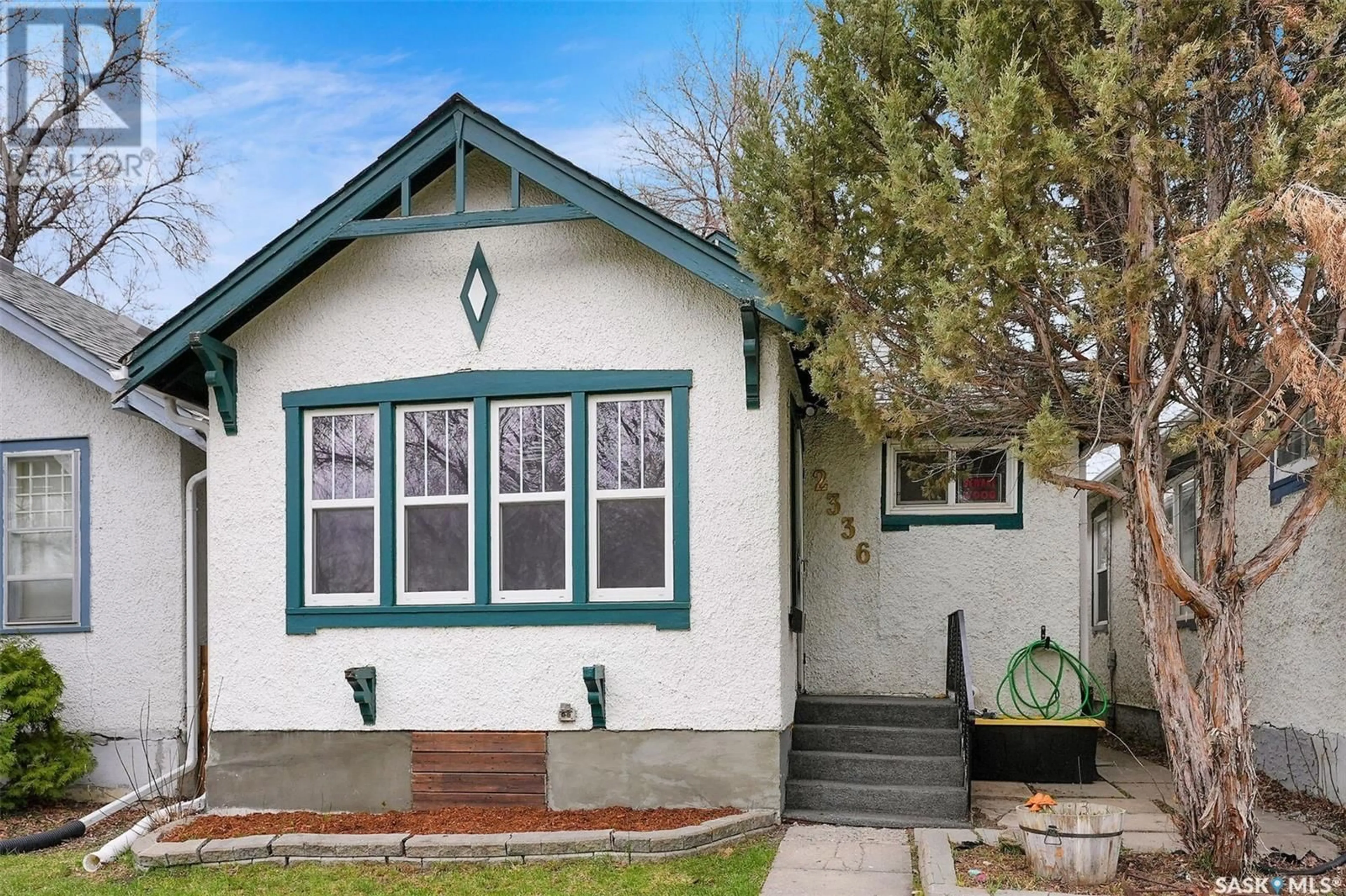 Home with vinyl exterior material, street for 2336 ATKINSON STREET, Regina Saskatchewan S4N3X3