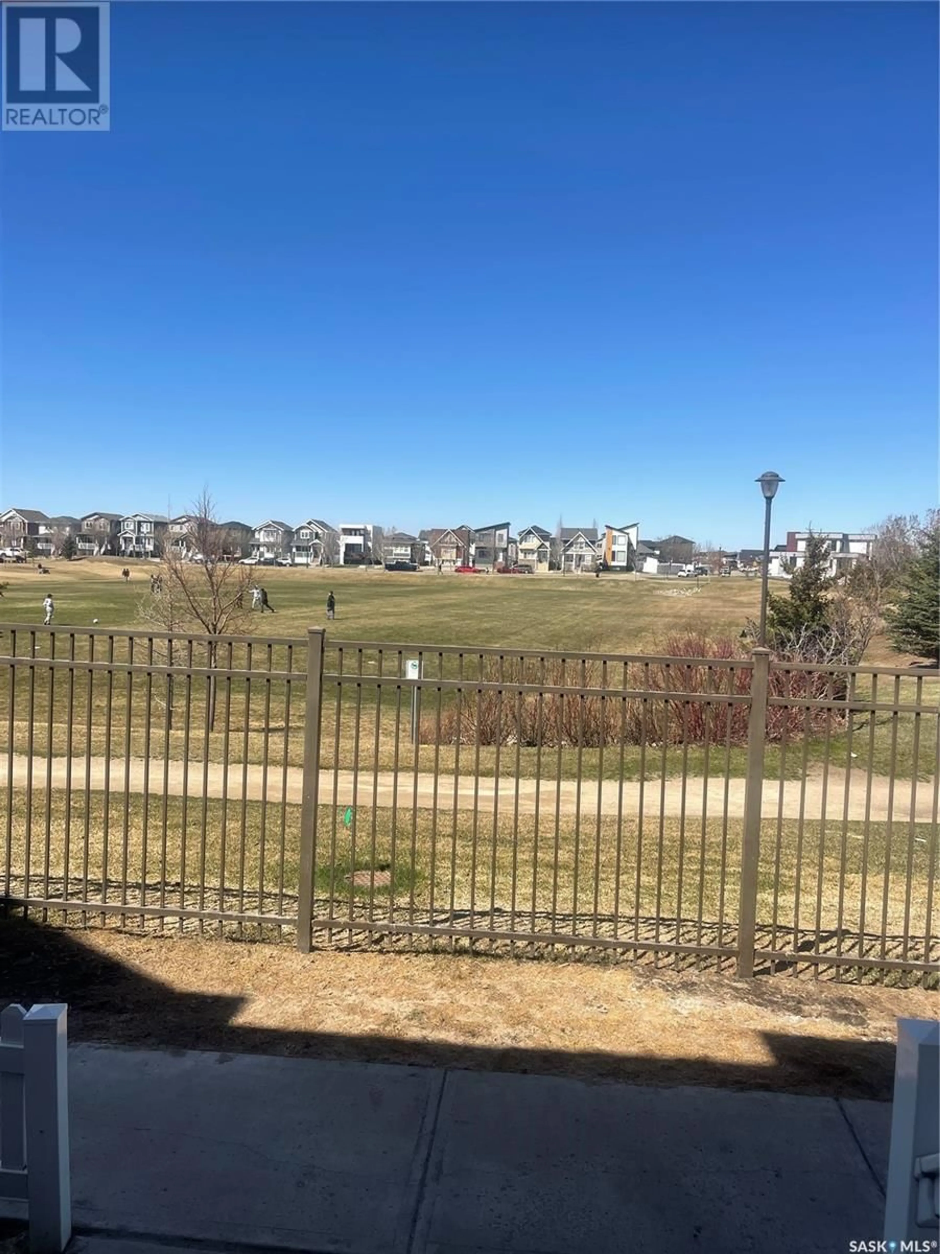 A pic from outside/outdoor area/front of a property/back of a property/a pic from drone, water/lake/river/ocean view for 22 5286 AERODROME ROAD, Regina Saskatchewan S4W0H7