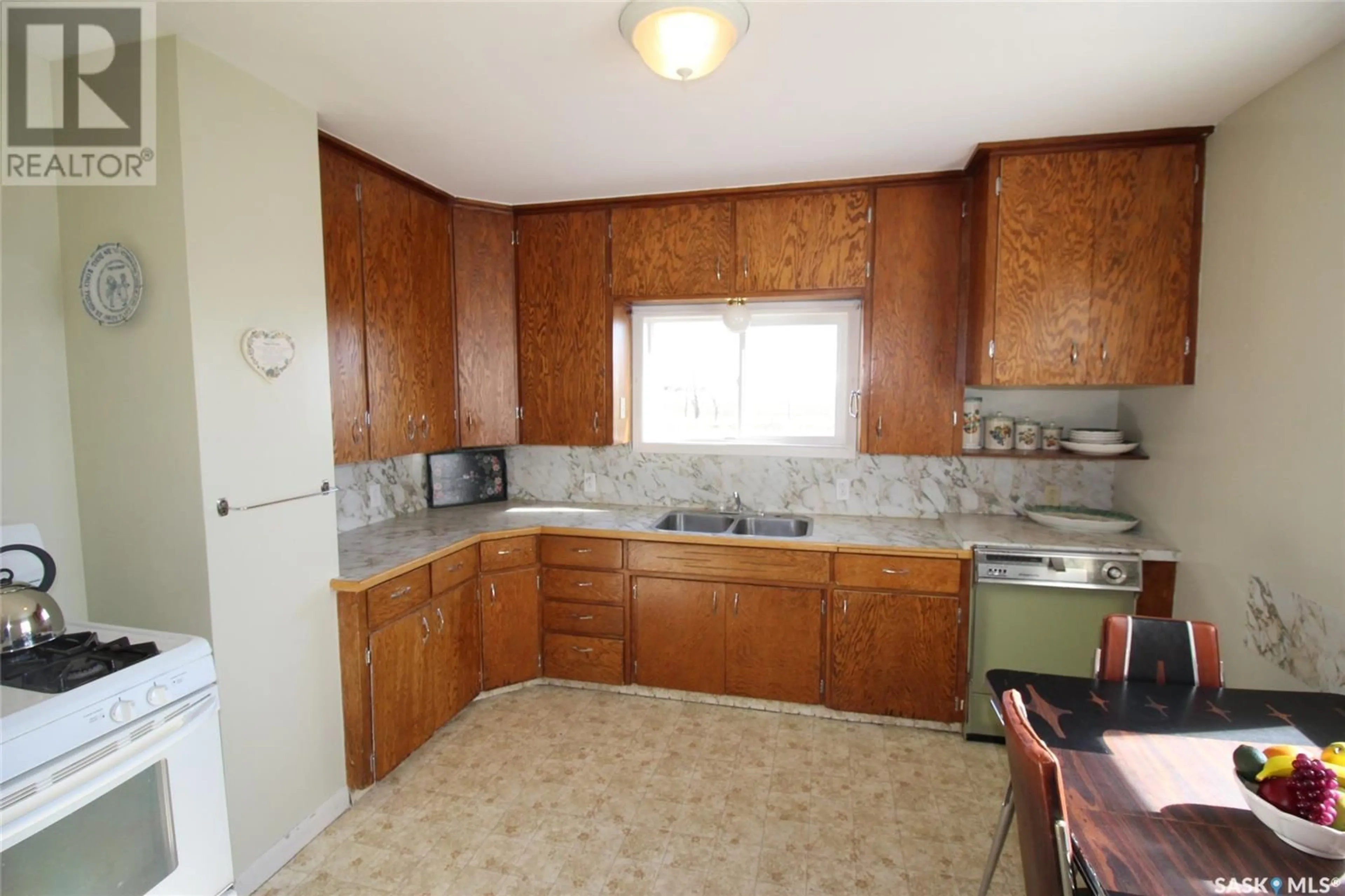 Standard kitchen, ceramic/tile floor for 710 RAILWAY AVENUE, Dollard Saskatchewan S0N0S0