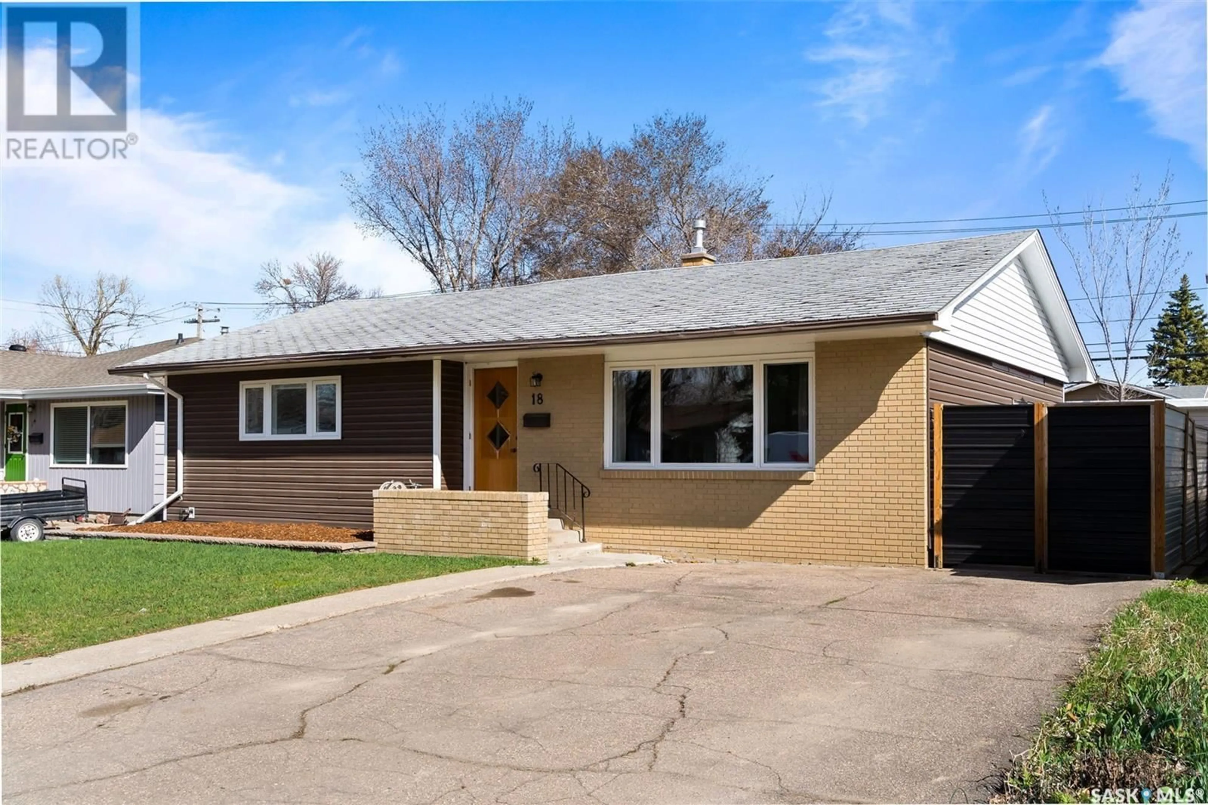 Home with vinyl exterior material, street for 18 MILLAR CRESCENT, Regina Saskatchewan S4S1N2