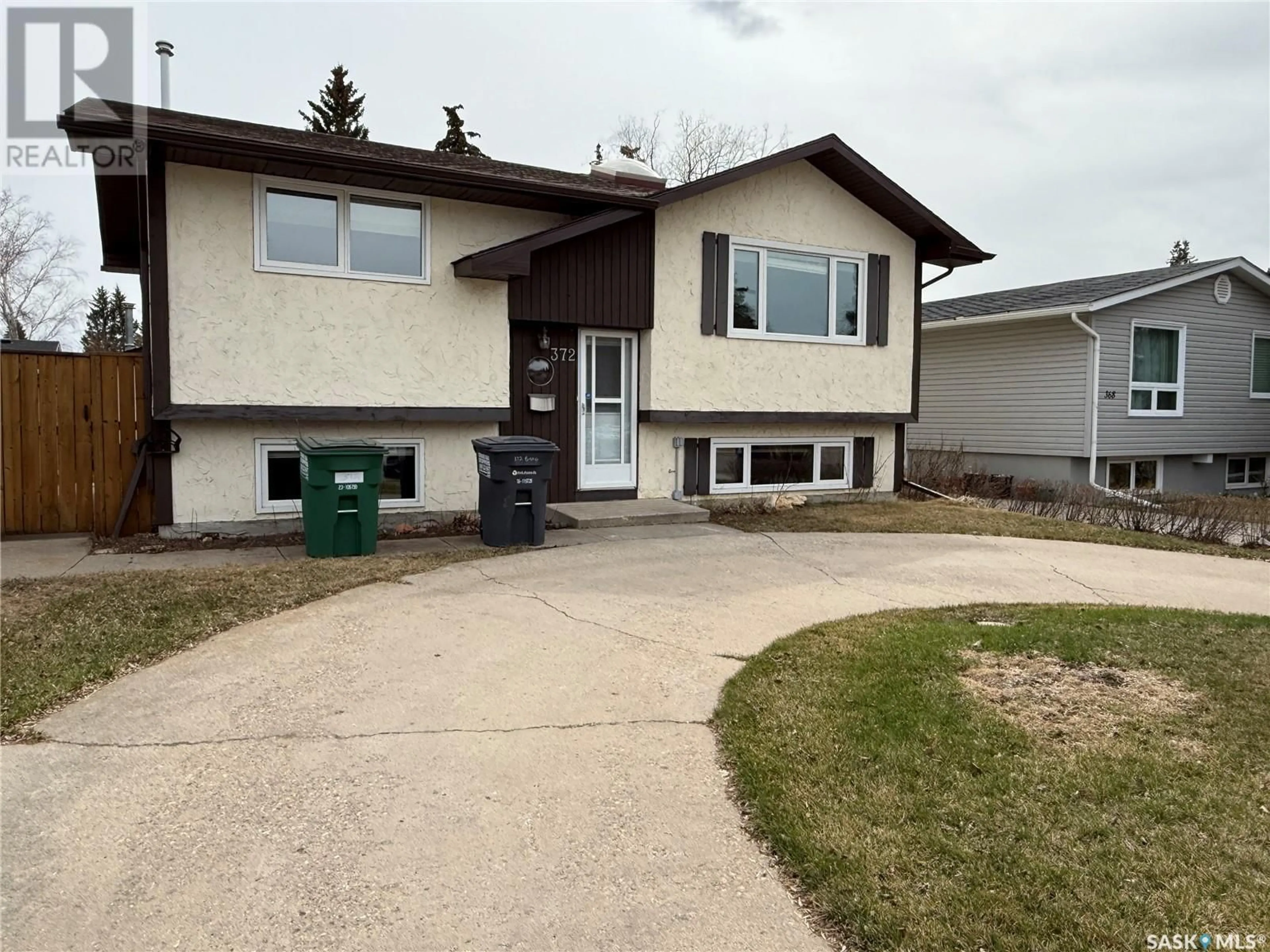 Home with vinyl exterior material, street for 372 BIRCH CRESCENT, Saskatoon Saskatchewan S7N2M6