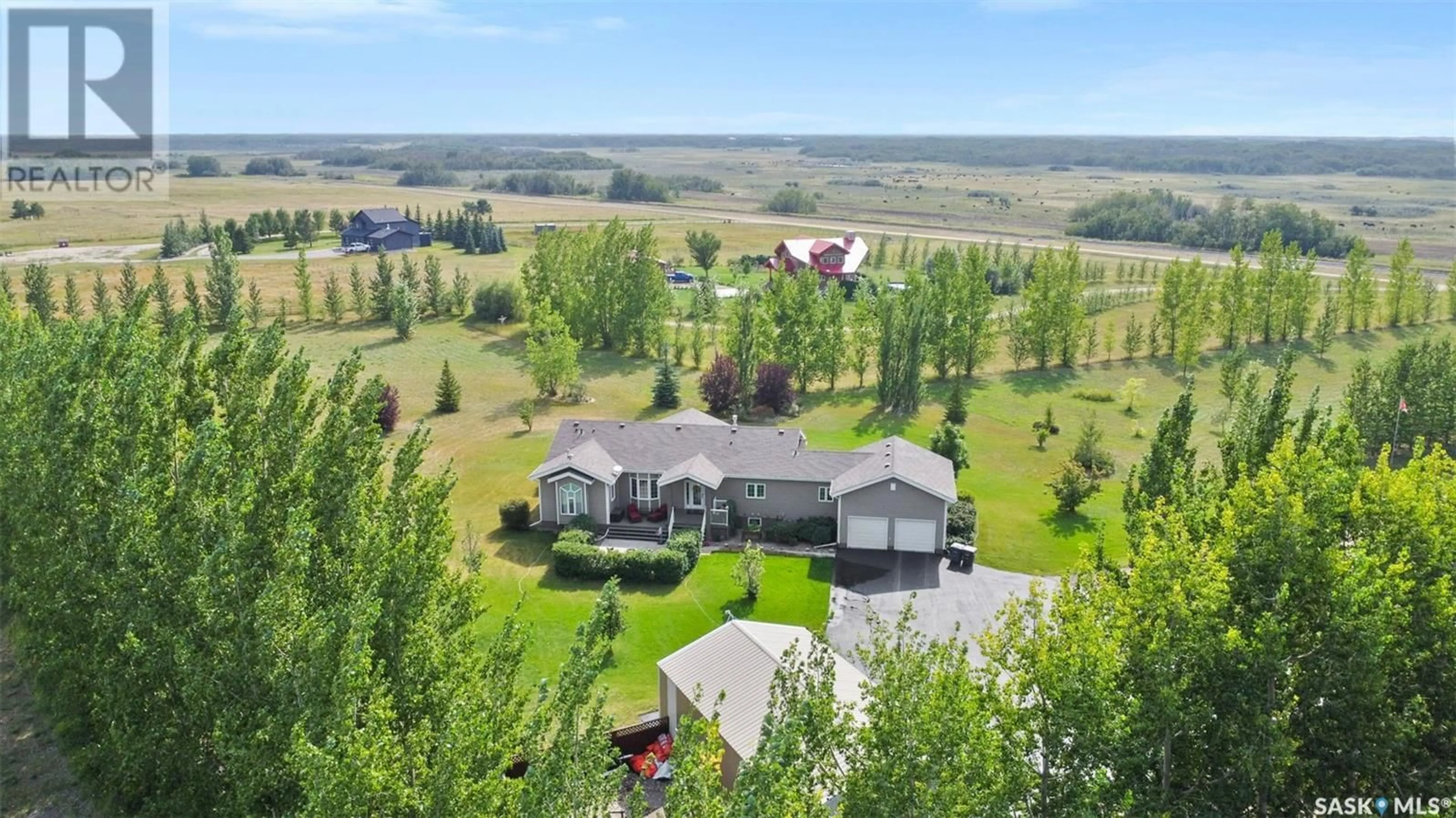 A pic from outside/outdoor area/front of a property/back of a property/a pic from drone, mountain view for 9 SILVERADO ESTATES, Dundurn Rm No. 314 Saskatchewan S7C0C4