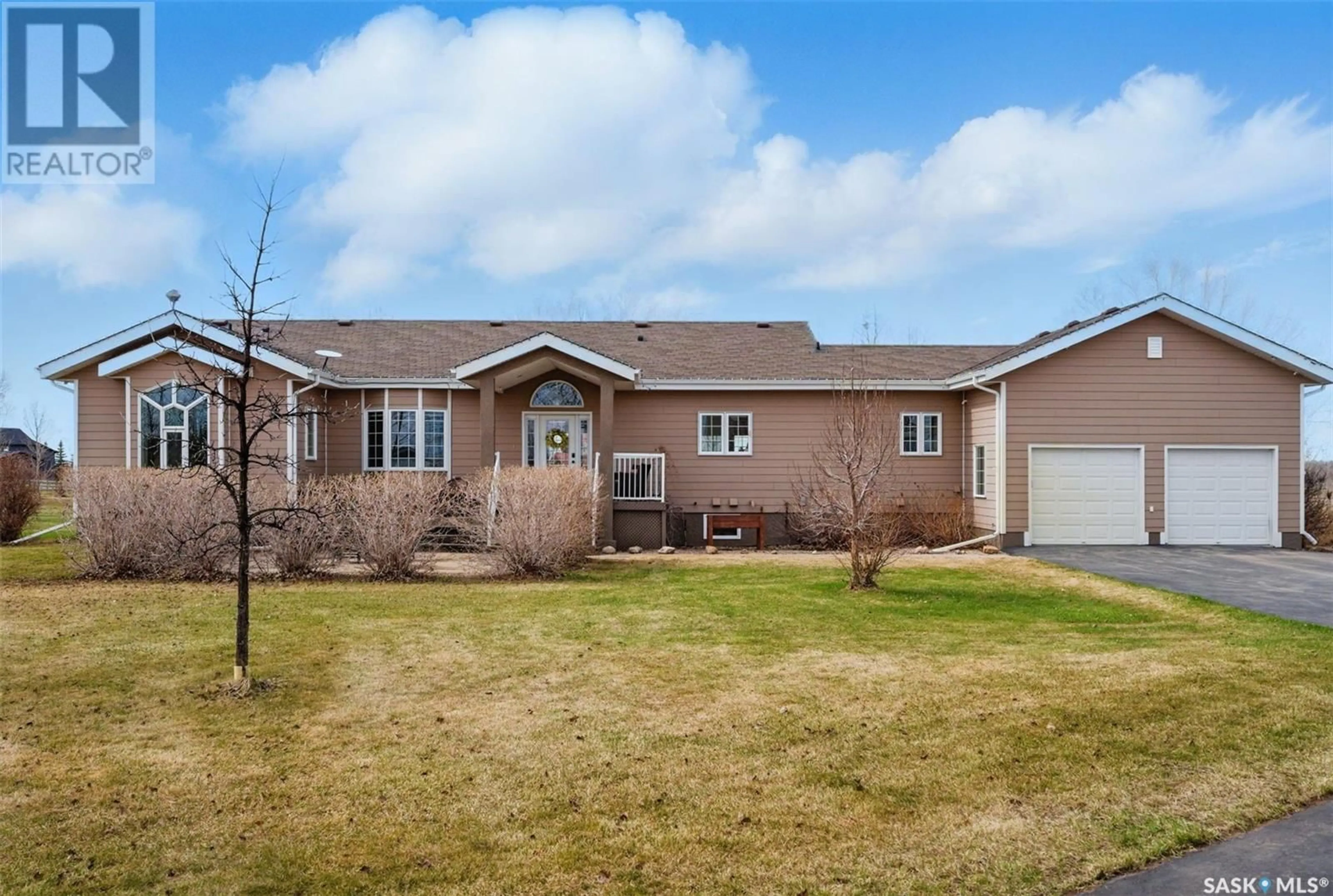 Home with vinyl exterior material, street for 9 SILVERADO ESTATES, Dundurn Rm No. 314 Saskatchewan S7C0C4