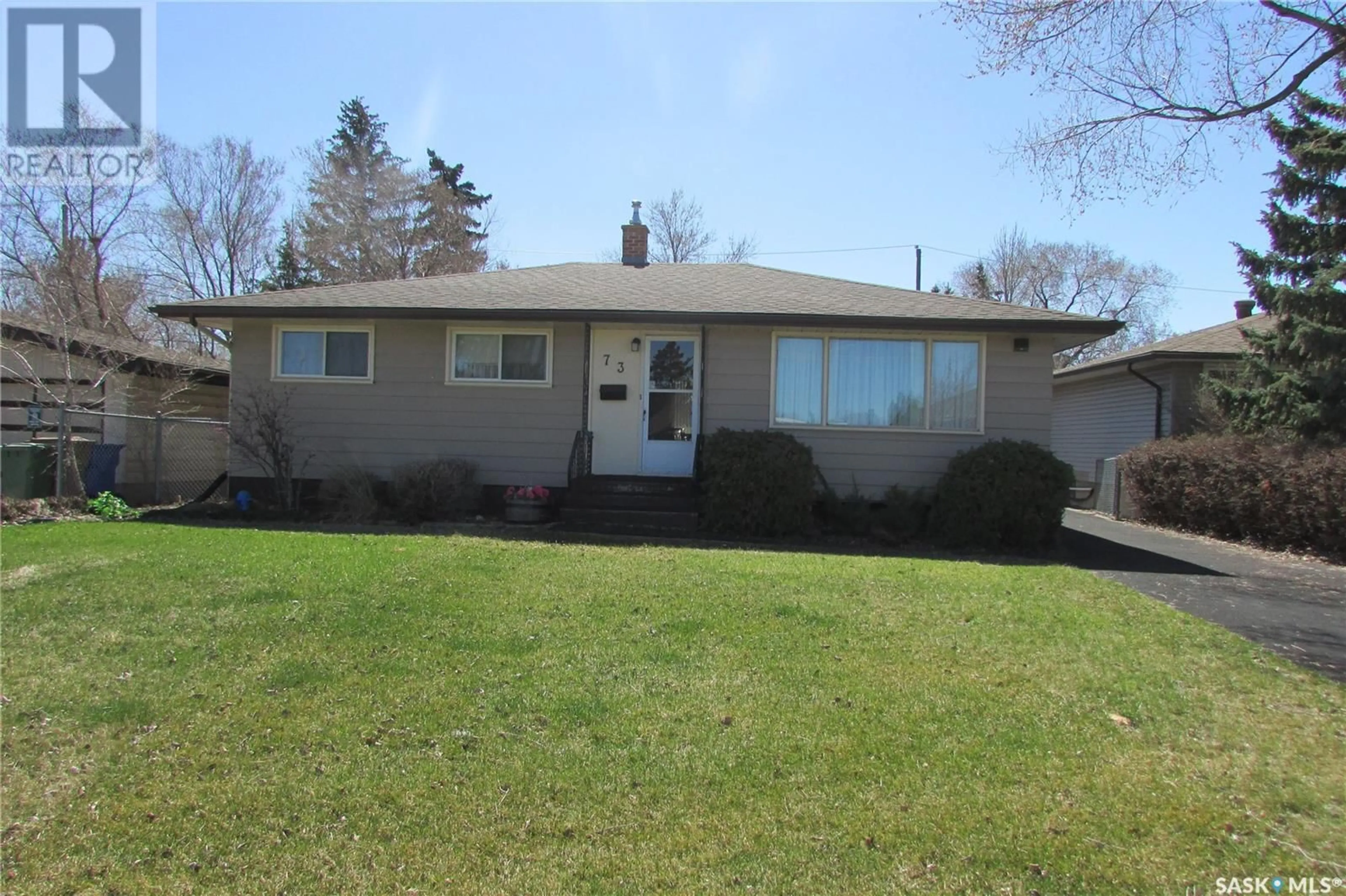 Home with vinyl exterior material, street for 73 MCCAUL CRESCENT, Regina Saskatchewan S4R3X3