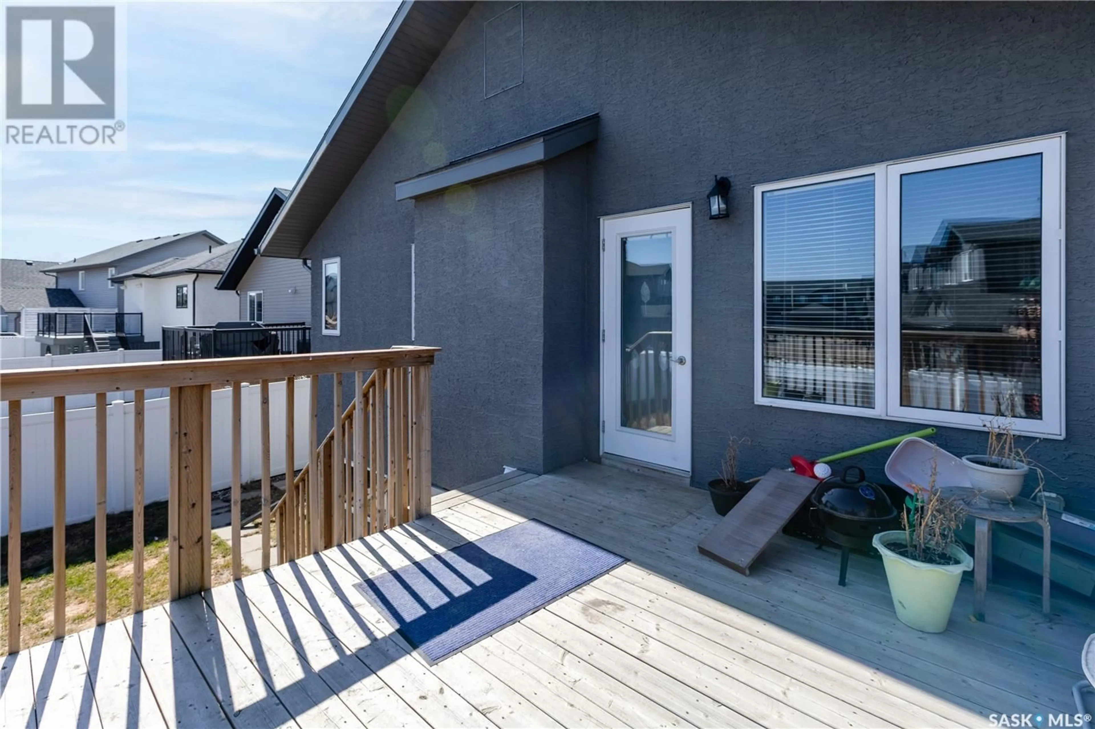 Patio, water/lake/river/ocean view for 118 MAHABIR CRESCENT, Saskatoon Saskatchewan S7W0J6