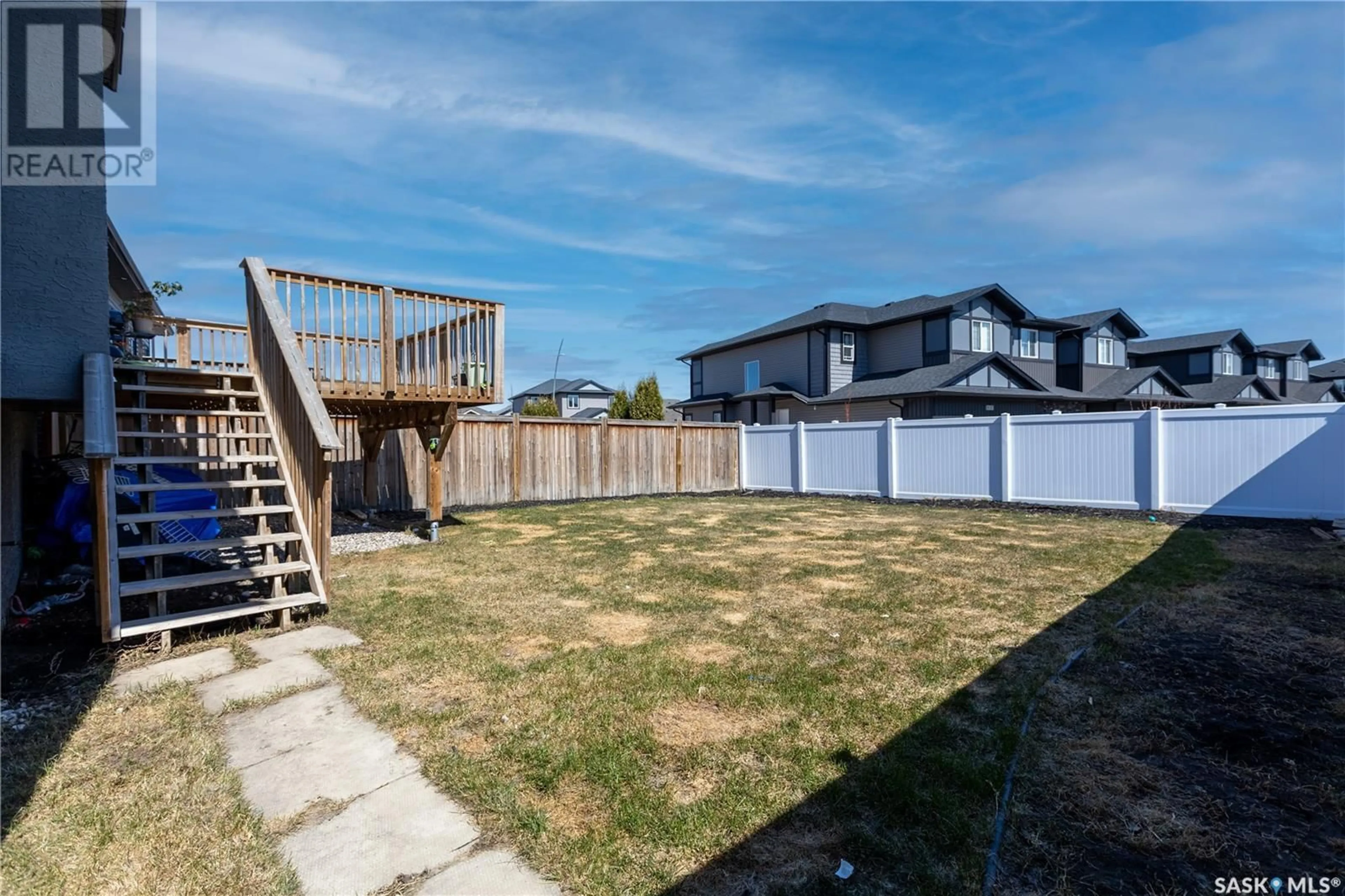 A pic from outside/outdoor area/front of a property/back of a property/a pic from drone, mountain view for 118 MAHABIR CRESCENT, Saskatoon Saskatchewan S7W0J6
