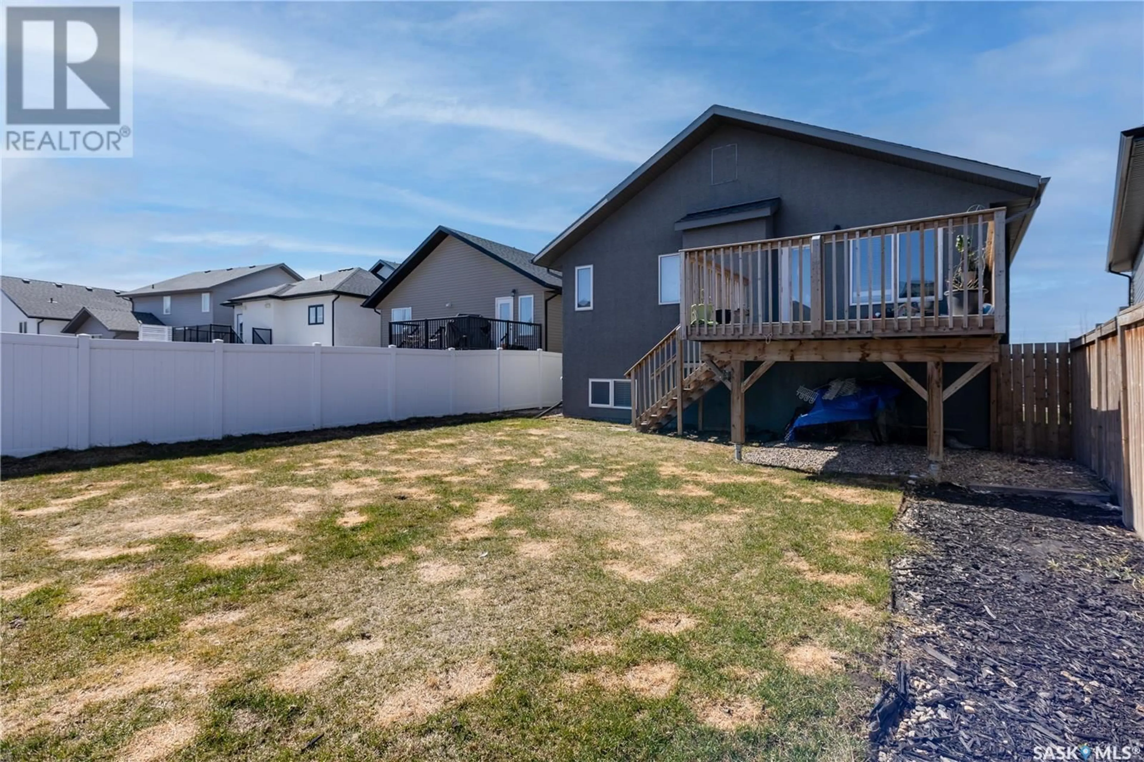 A pic from outside/outdoor area/front of a property/back of a property/a pic from drone, water/lake/river/ocean view for 118 MAHABIR CRESCENT, Saskatoon Saskatchewan S7W0J6