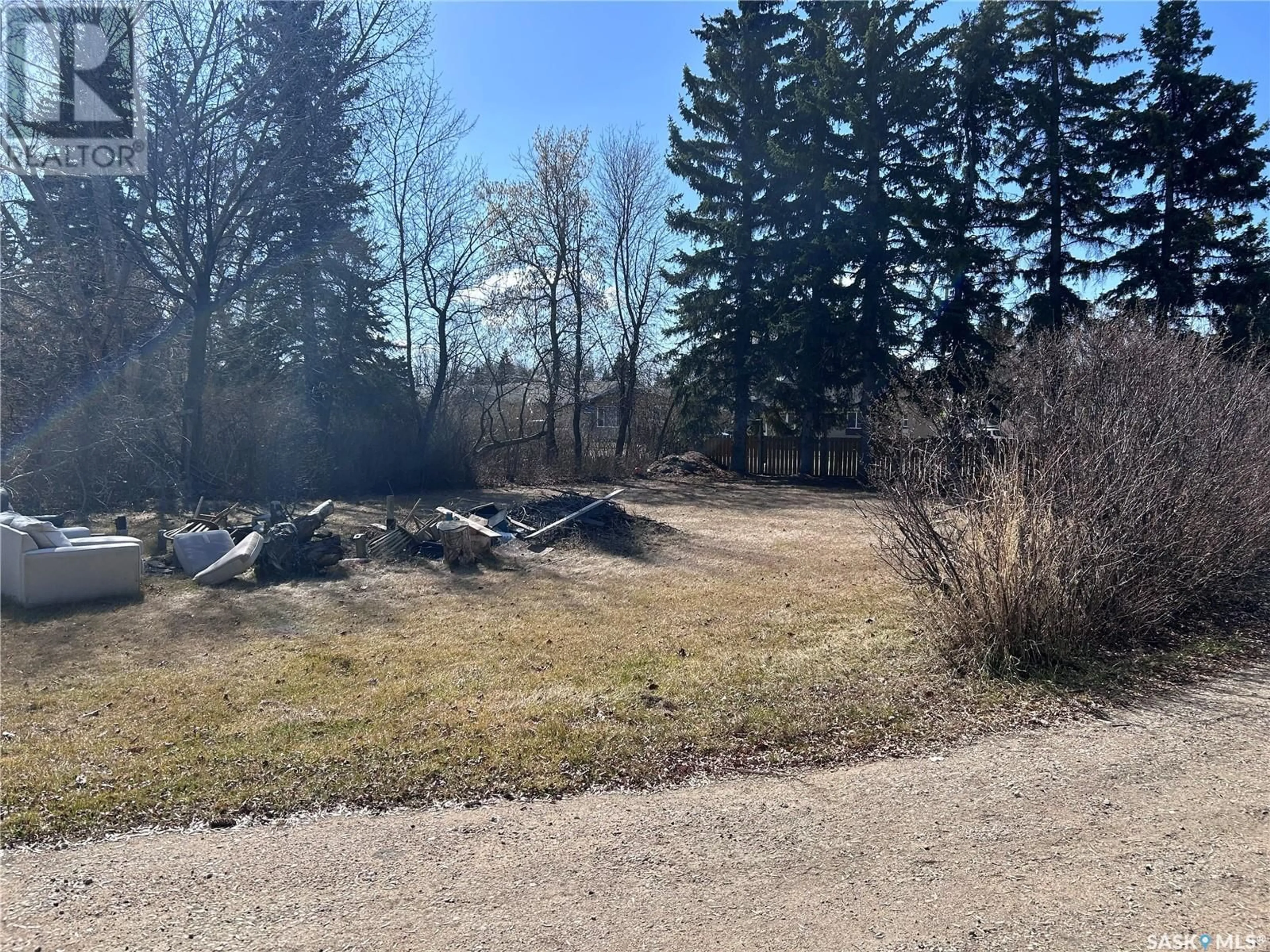 A pic from outside/outdoor area/front of a property/back of a property/a pic from drone, forest/trees view for 106 3RD AVENUE, Maidstone Saskatchewan S0M1M0