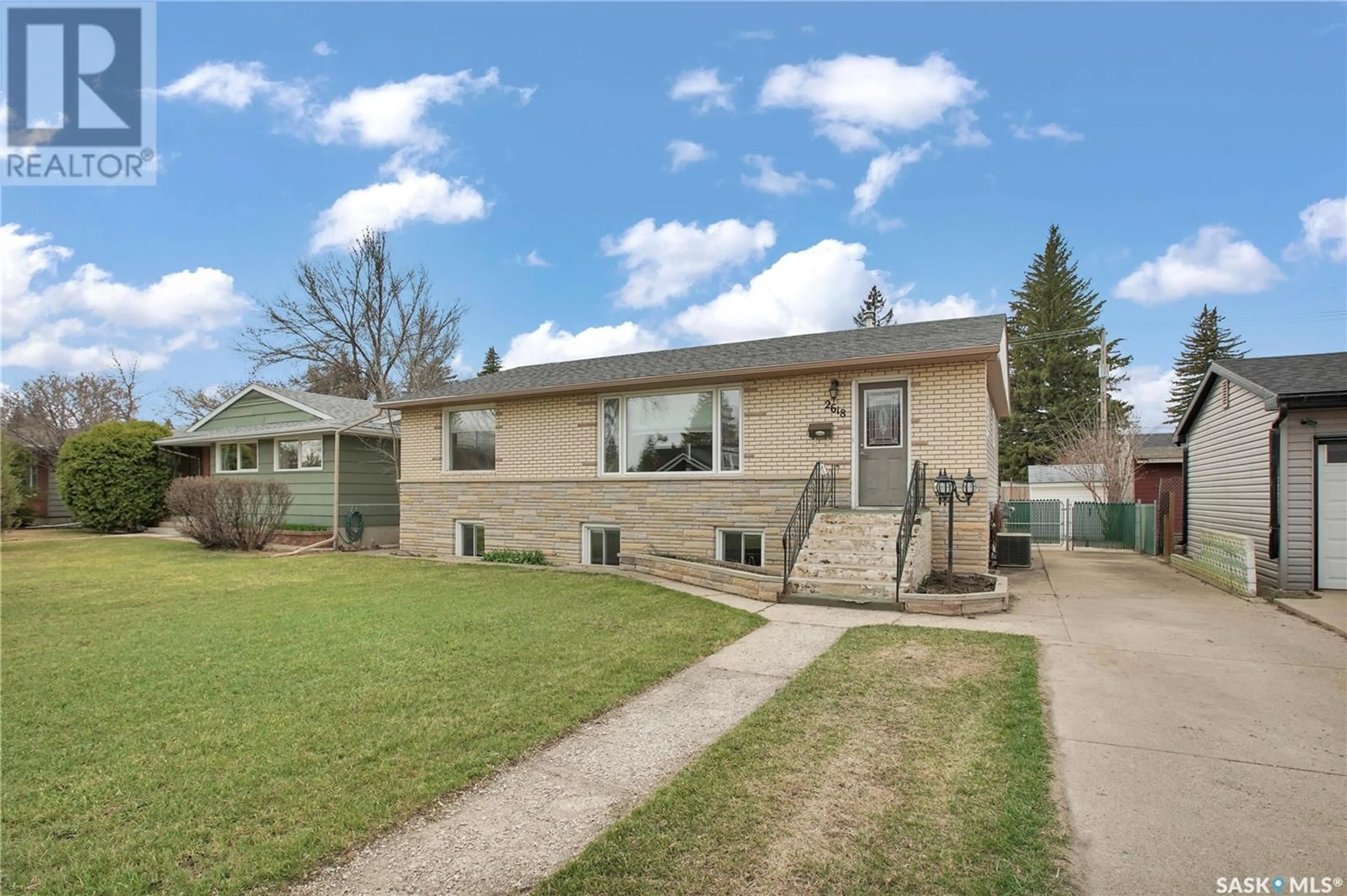 Home with vinyl exterior material, street for 2618 CLARENCE AVENUE, Saskatoon Saskatchewan S7J1M4