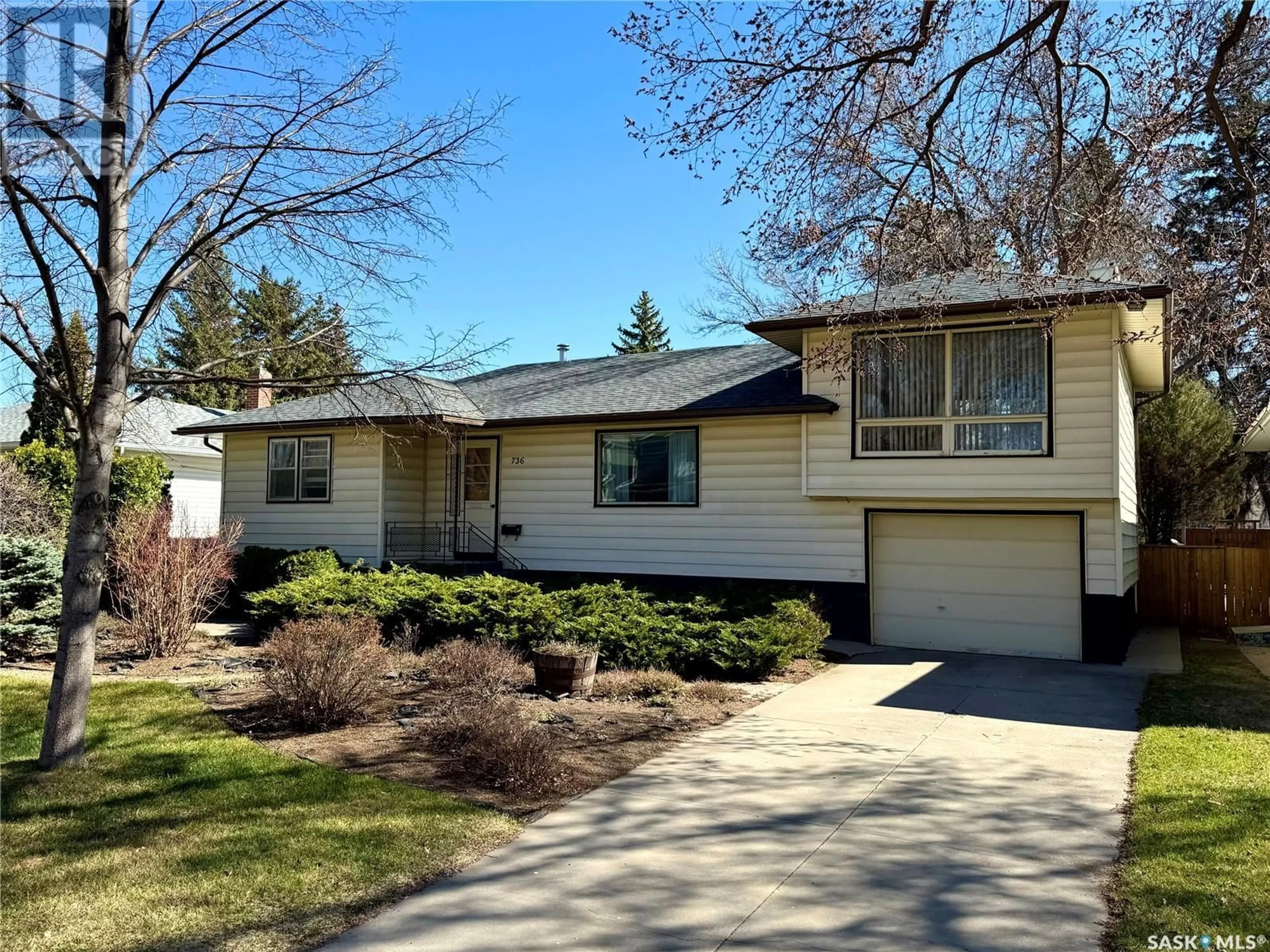 Home with vinyl exterior material, street for 736 1ST STREET, Saskatoon Saskatchewan S7H1T1