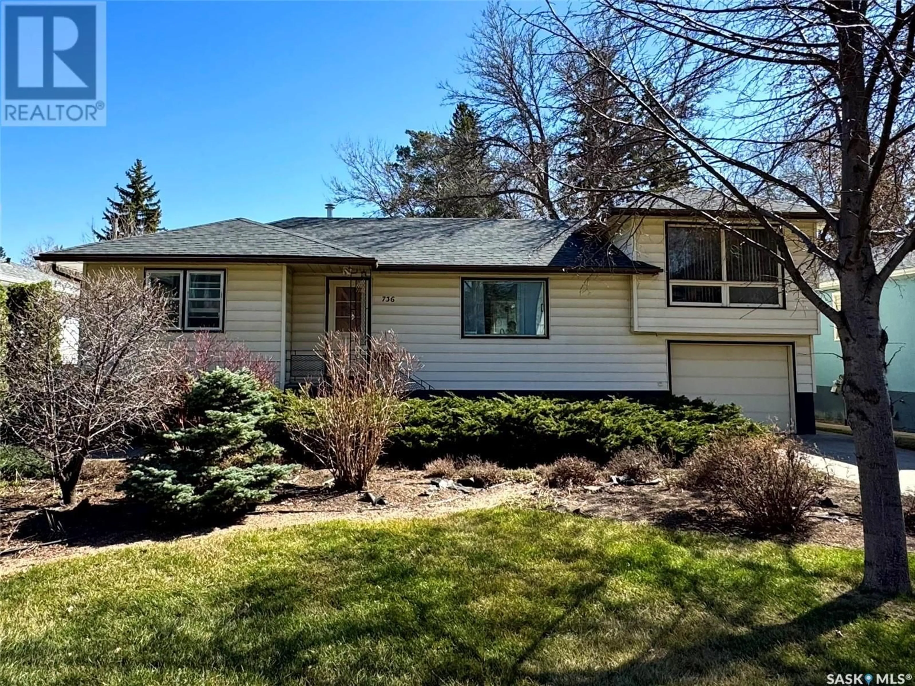 Home with vinyl exterior material, street for 736 1ST STREET, Saskatoon Saskatchewan S7H1T1