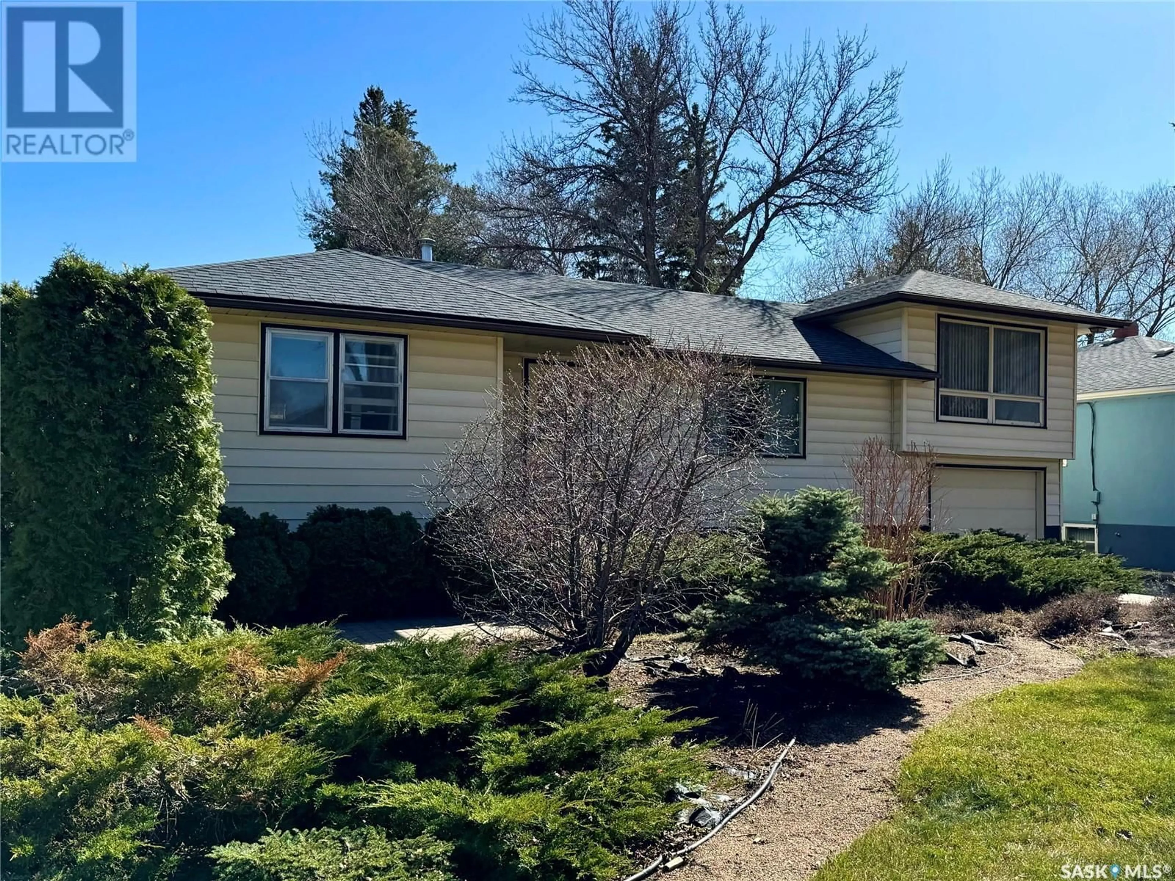 Home with vinyl exterior material, street for 736 1ST STREET, Saskatoon Saskatchewan S7H1T1