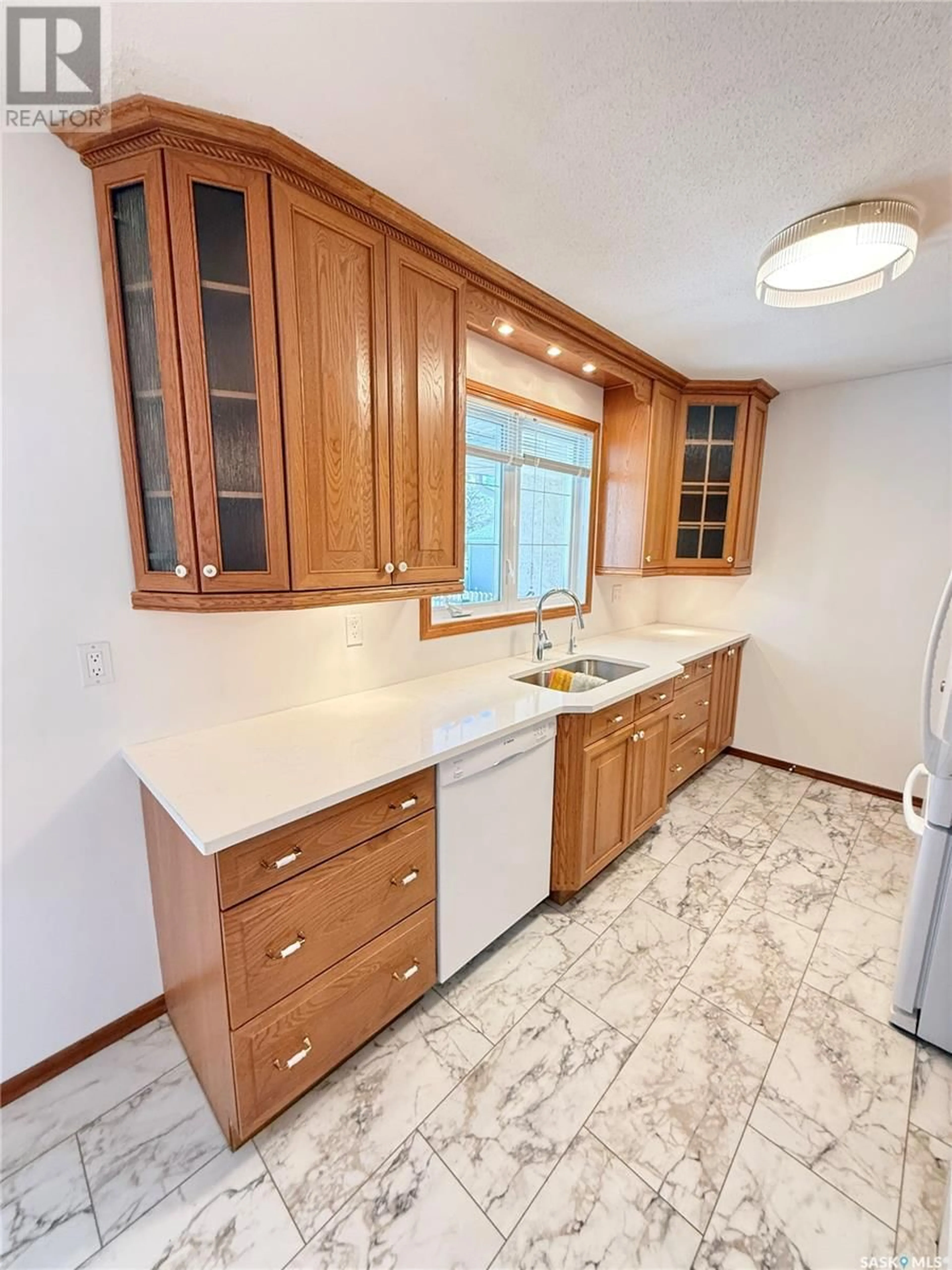 Standard kitchen, ceramic/tile floor for 716 WINDSOR STREET, Weyburn Saskatchewan S4H0X4