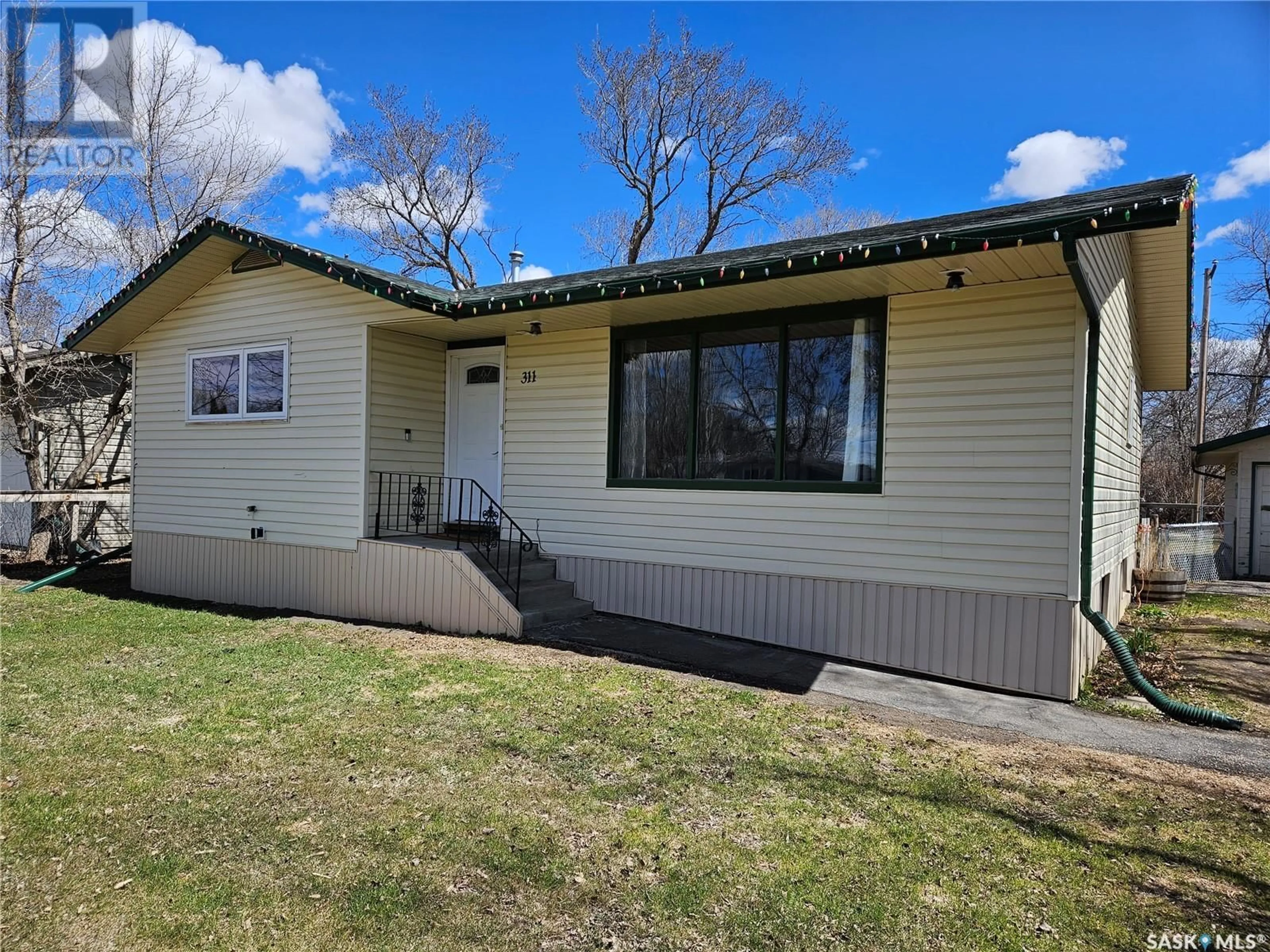 A pic from outside/outdoor area/front of a property/back of a property/a pic from drone, street for 311 7TH STREET, Carlyle Saskatchewan S0C0R0