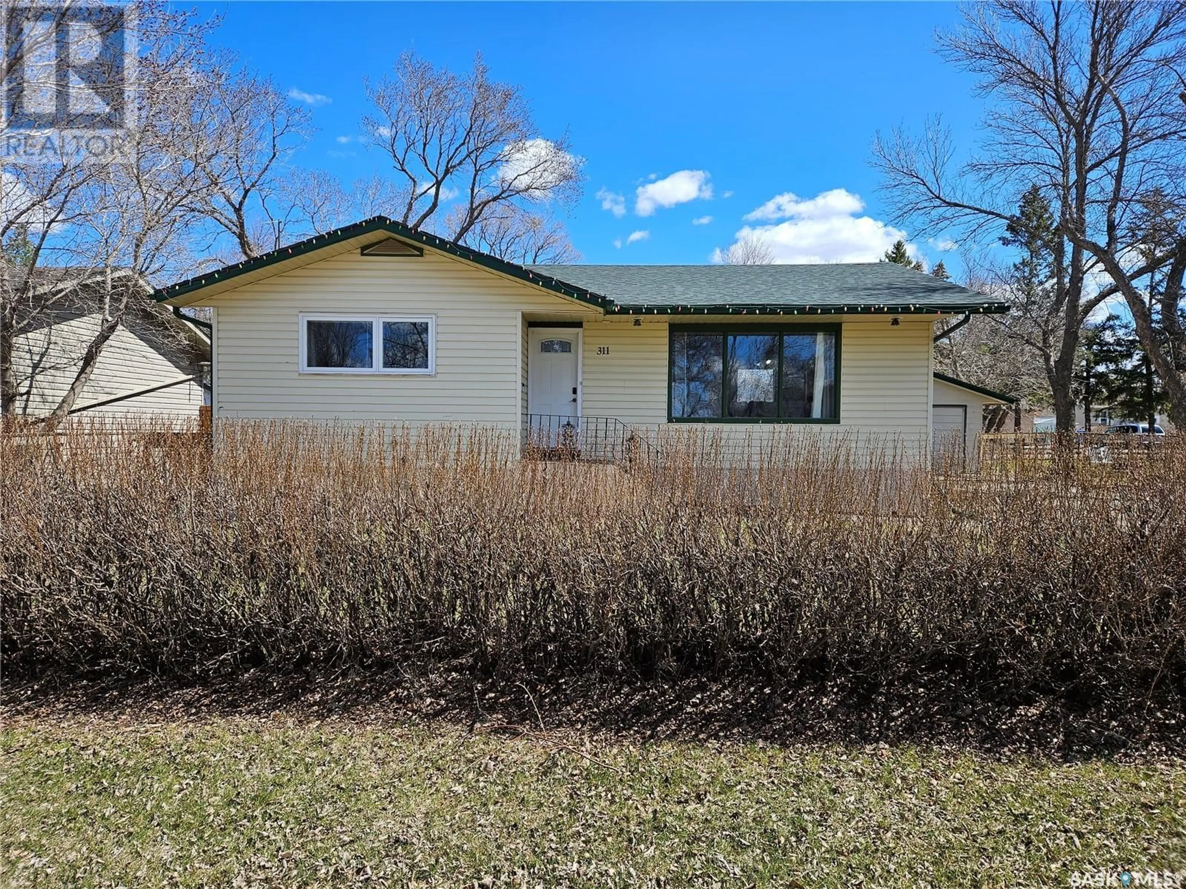 Home with vinyl exterior material, street for 311 7TH STREET, Carlyle Saskatchewan S0C0R0