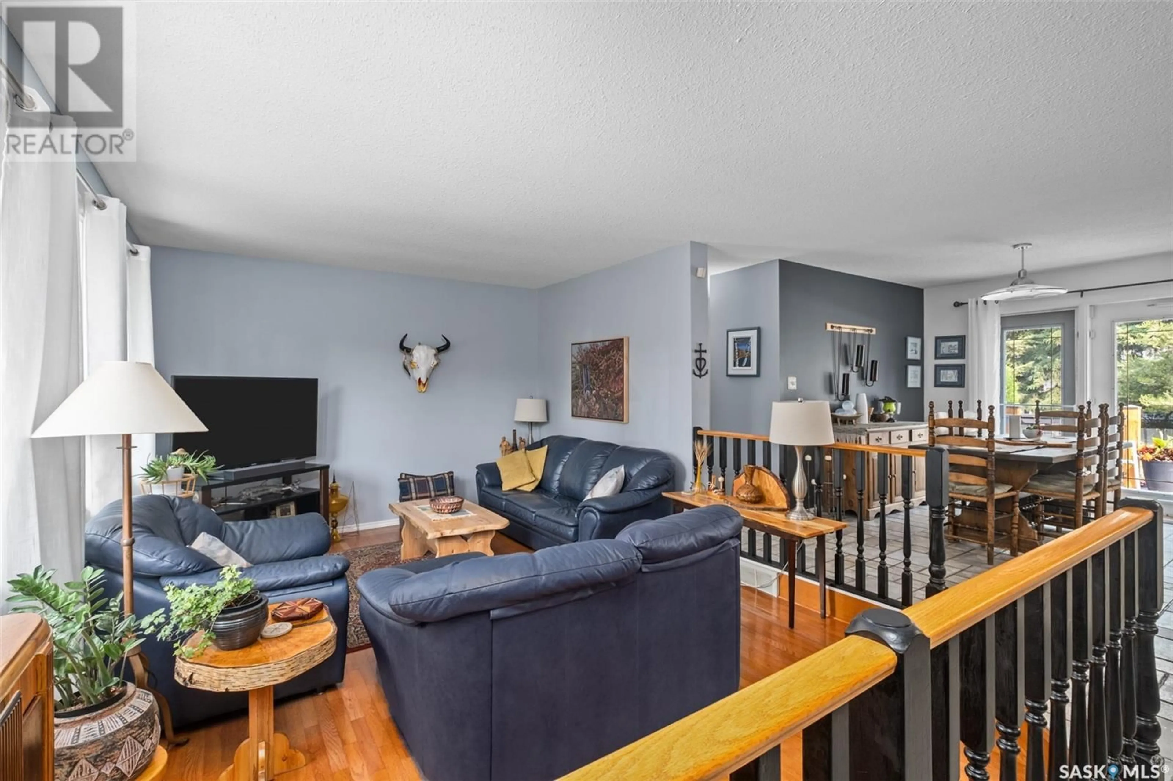 Living room with furniture, wood/laminate floor for 452 11TH STREET, Prince Albert Saskatchewan S6V5R3