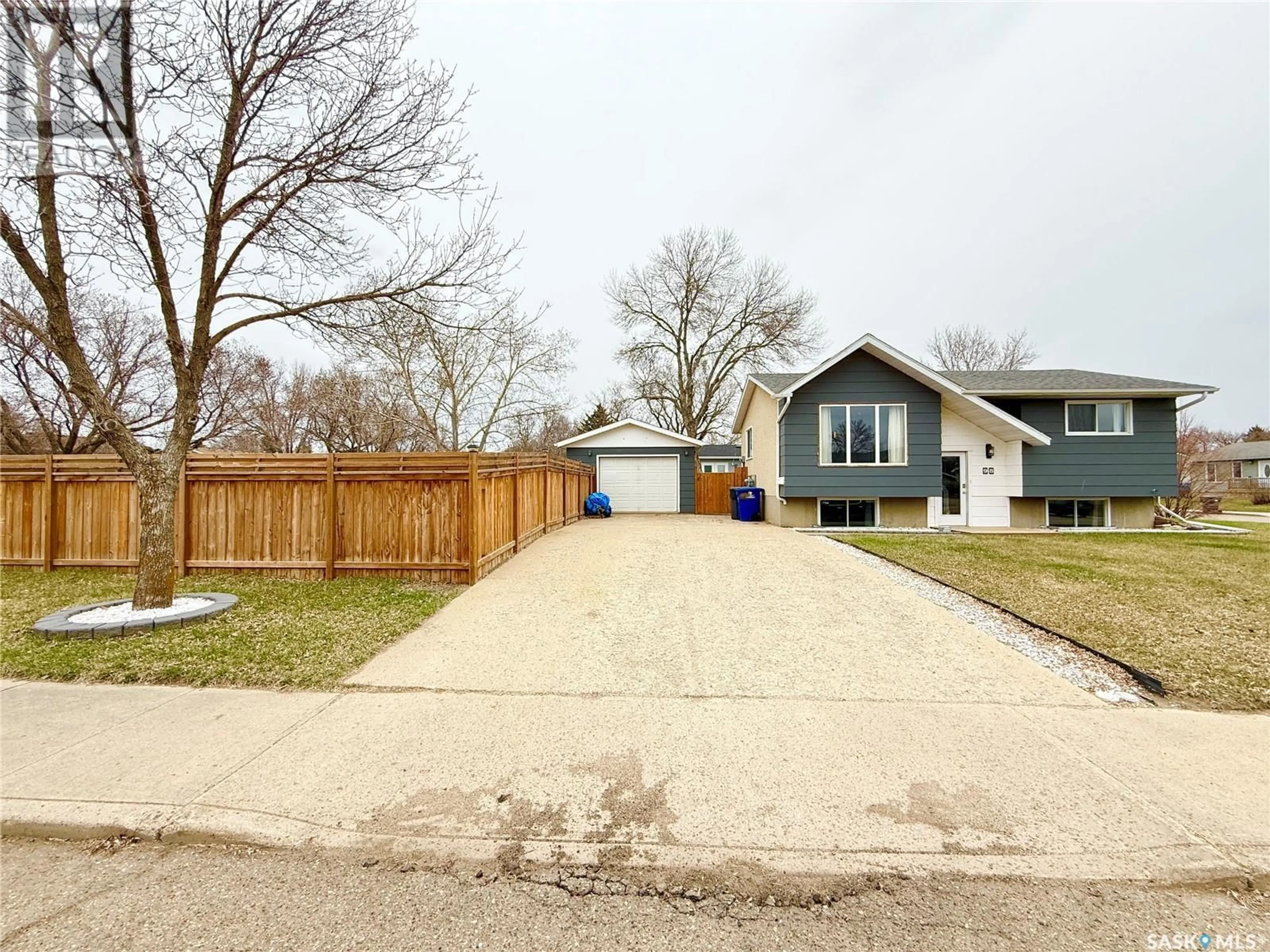 A pic from outside/outdoor area/front of a property/back of a property/a pic from drone, street for 98 14TH STREET, Weyburn Saskatchewan S4H2N2