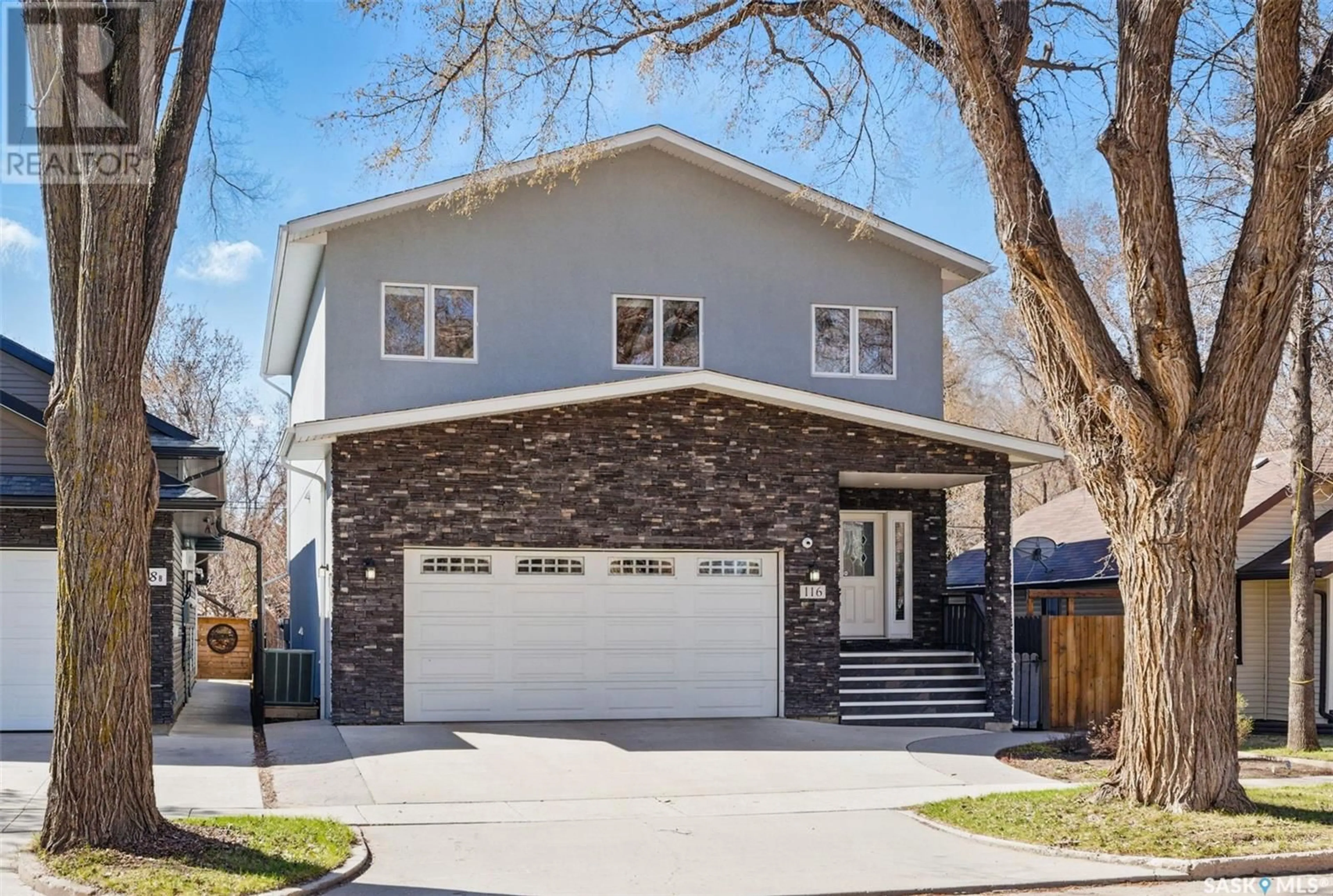 Home with brick exterior material, street for 116 HILLIARD STREET E, Saskatoon Saskatchewan S7J0E2