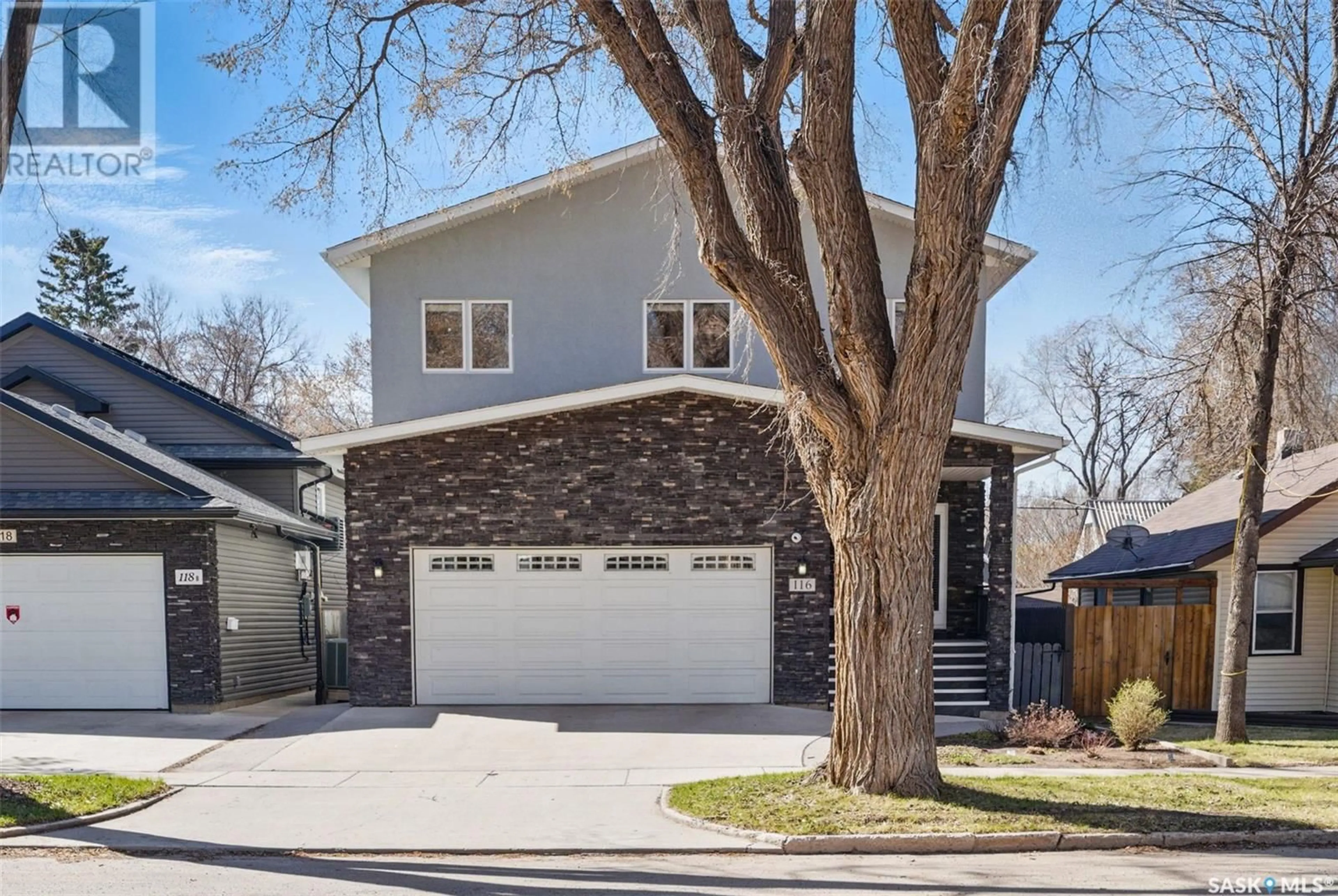 Home with brick exterior material, street for 116 HILLIARD STREET E, Saskatoon Saskatchewan S7J0E2