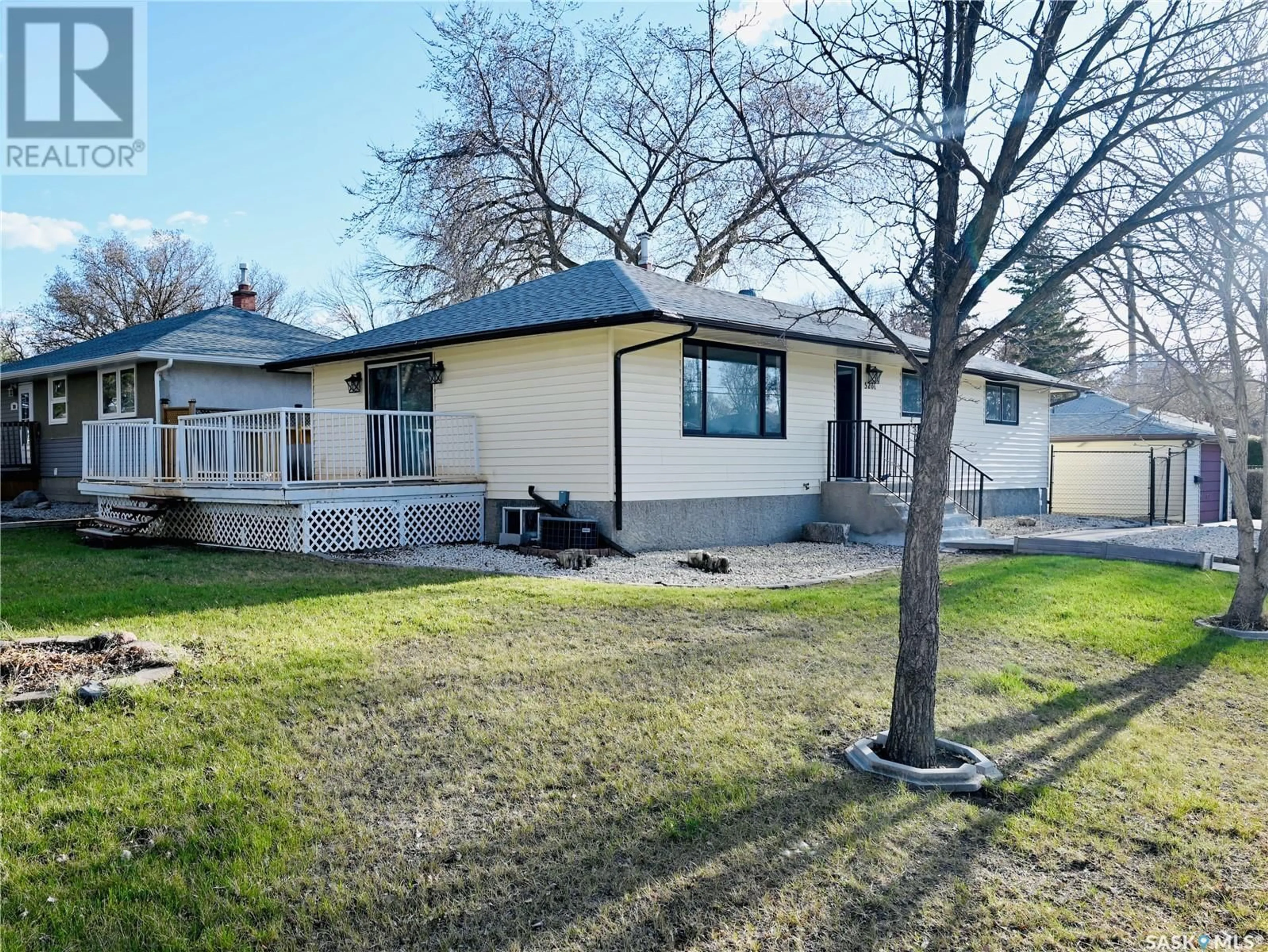A pic from outside/outdoor area/front of a property/back of a property/a pic from drone, street for 5201 1ST AVENUE, Regina Saskatchewan S4T0A7