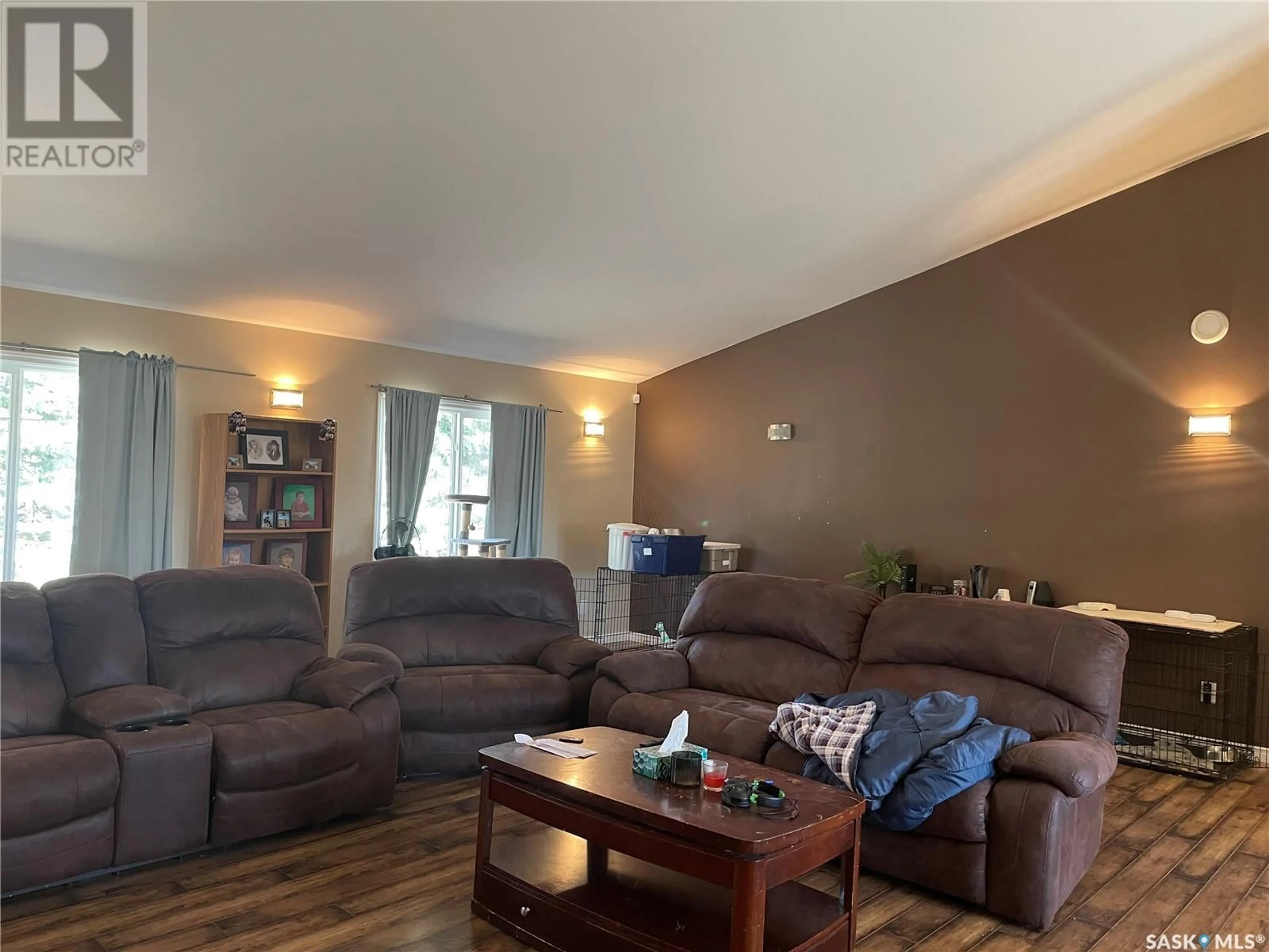 Living room with furniture, wood/laminate floor for 140 3RD STREET, Pierceland Saskatchewan S0M2K0