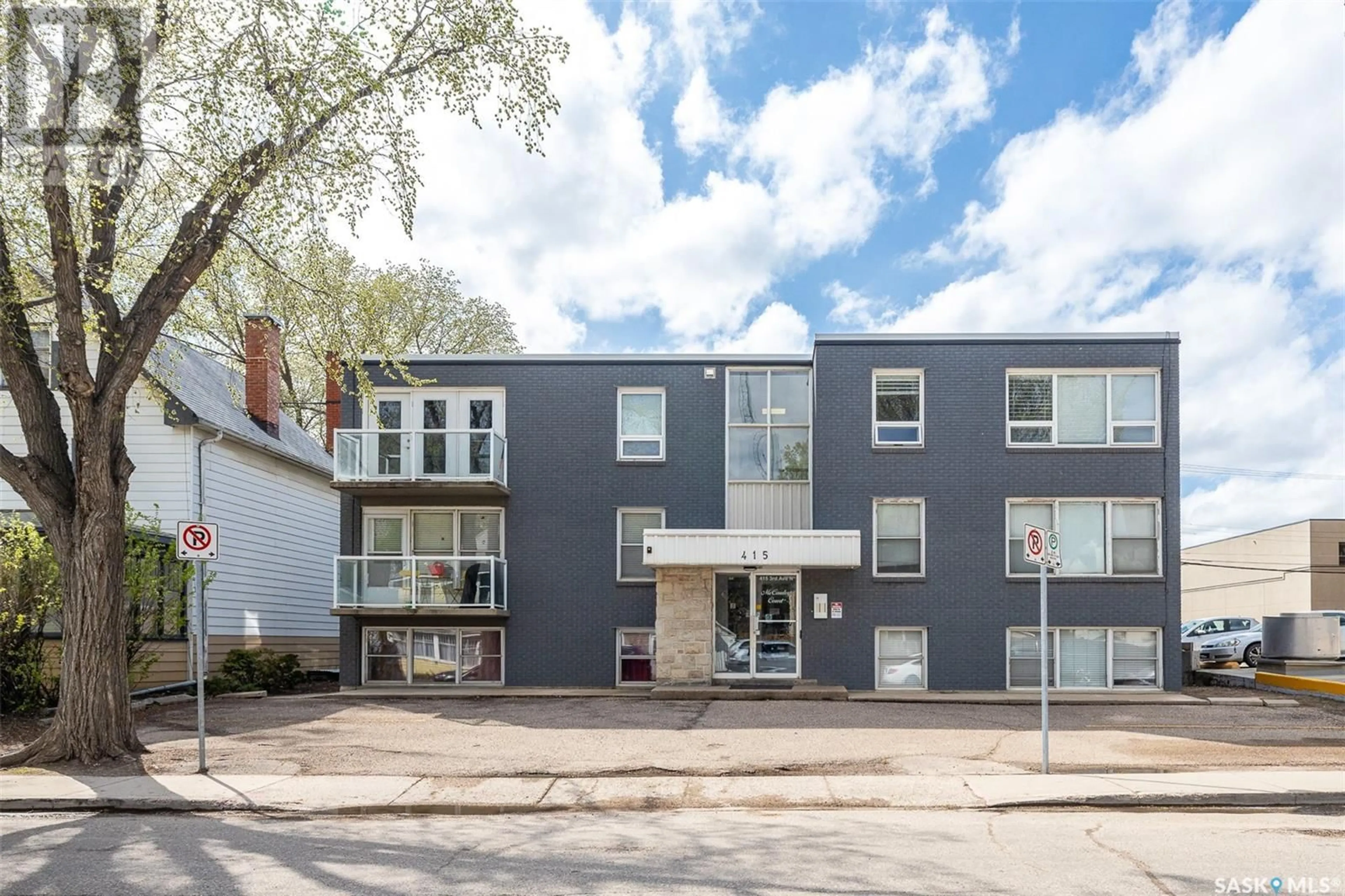 Home with brick exterior material, street for N - 205 415 3RD AVENUE, Saskatoon Saskatchewan S7J2J2