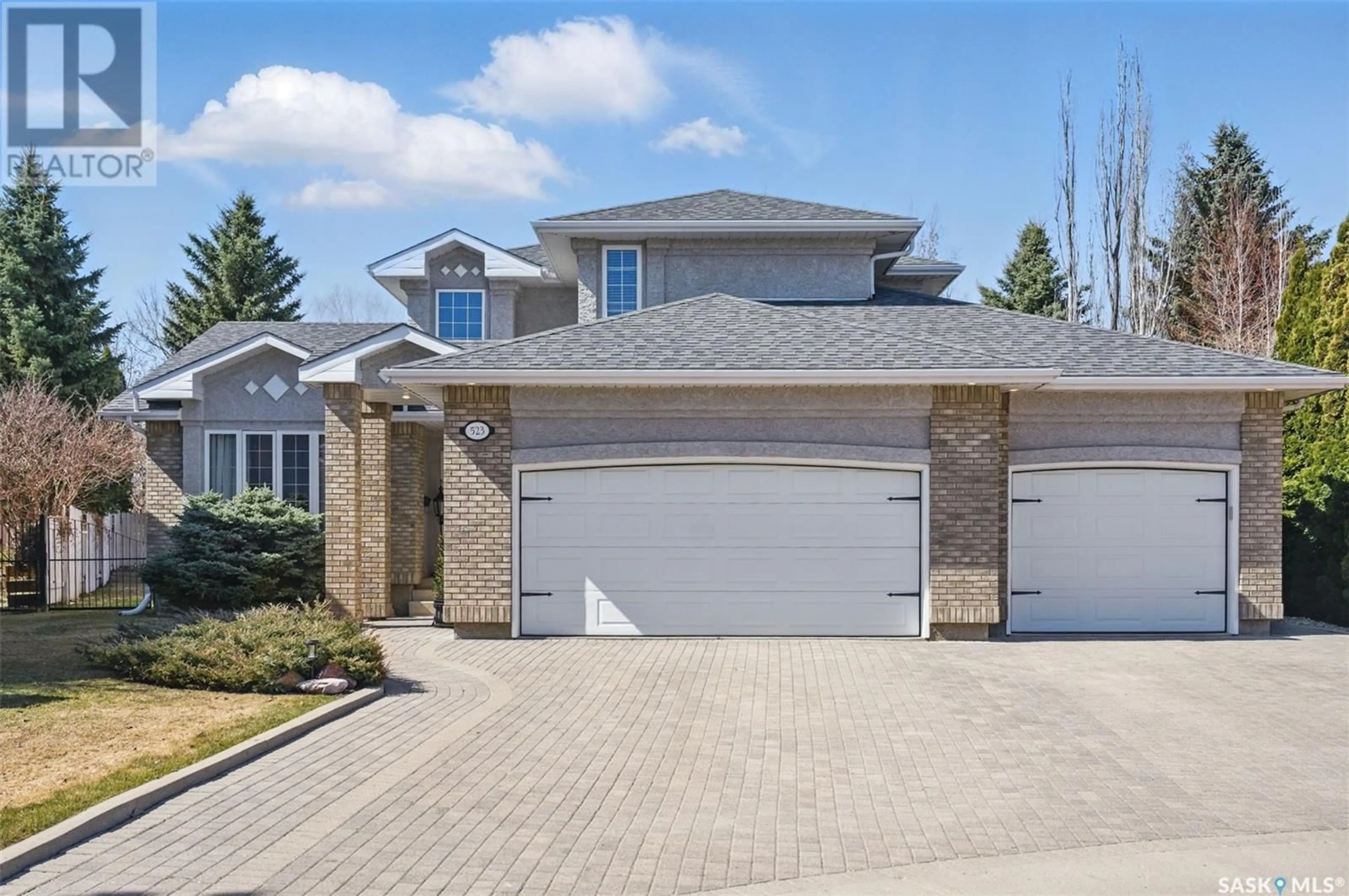 Home with brick exterior material, street for 523 MENDEL TERRACE, Saskatoon Saskatchewan S7J5J6