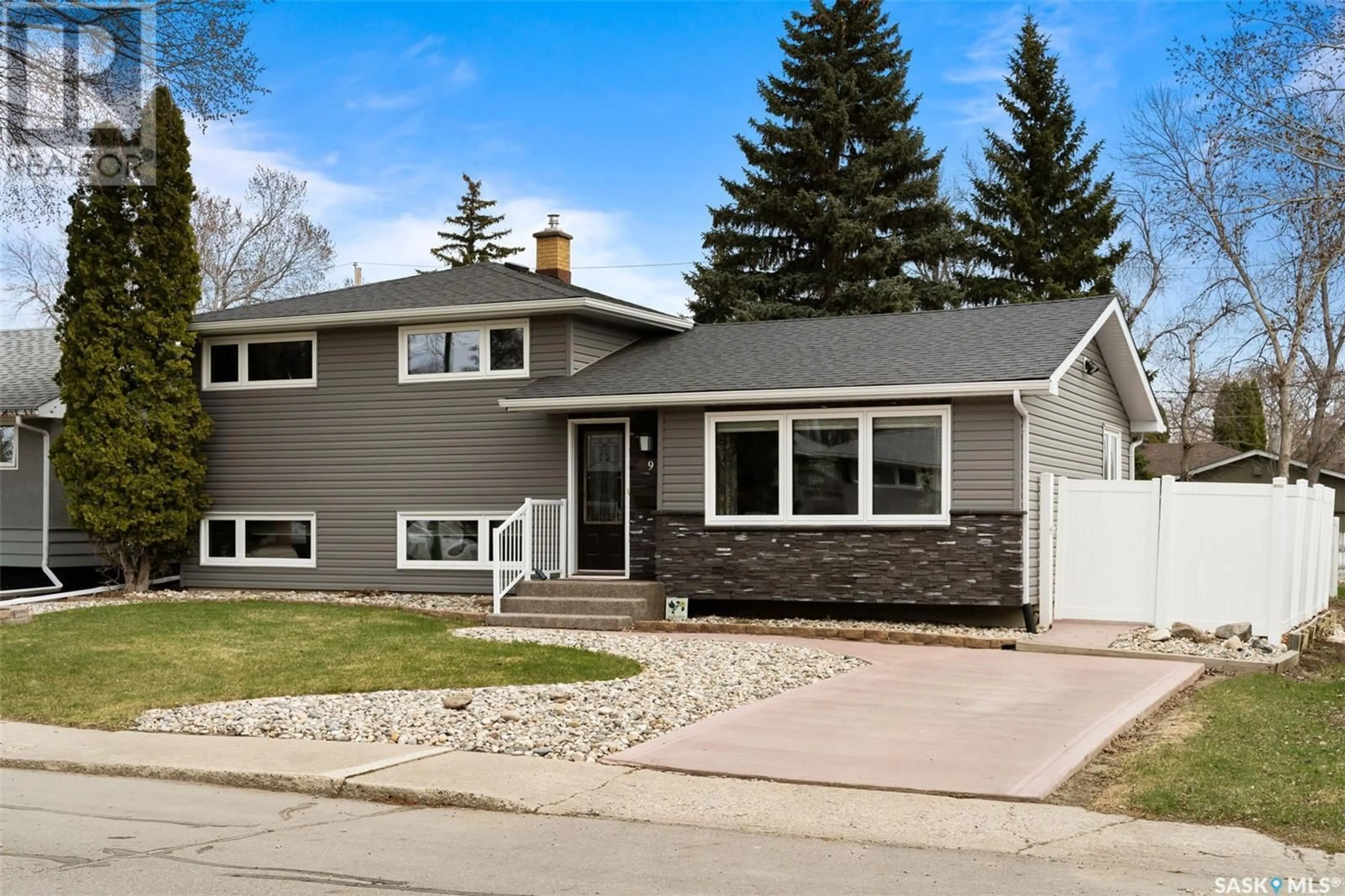 Home with vinyl exterior material, street for 9 PROBE STREET, Regina Saskatchewan S4R4V2