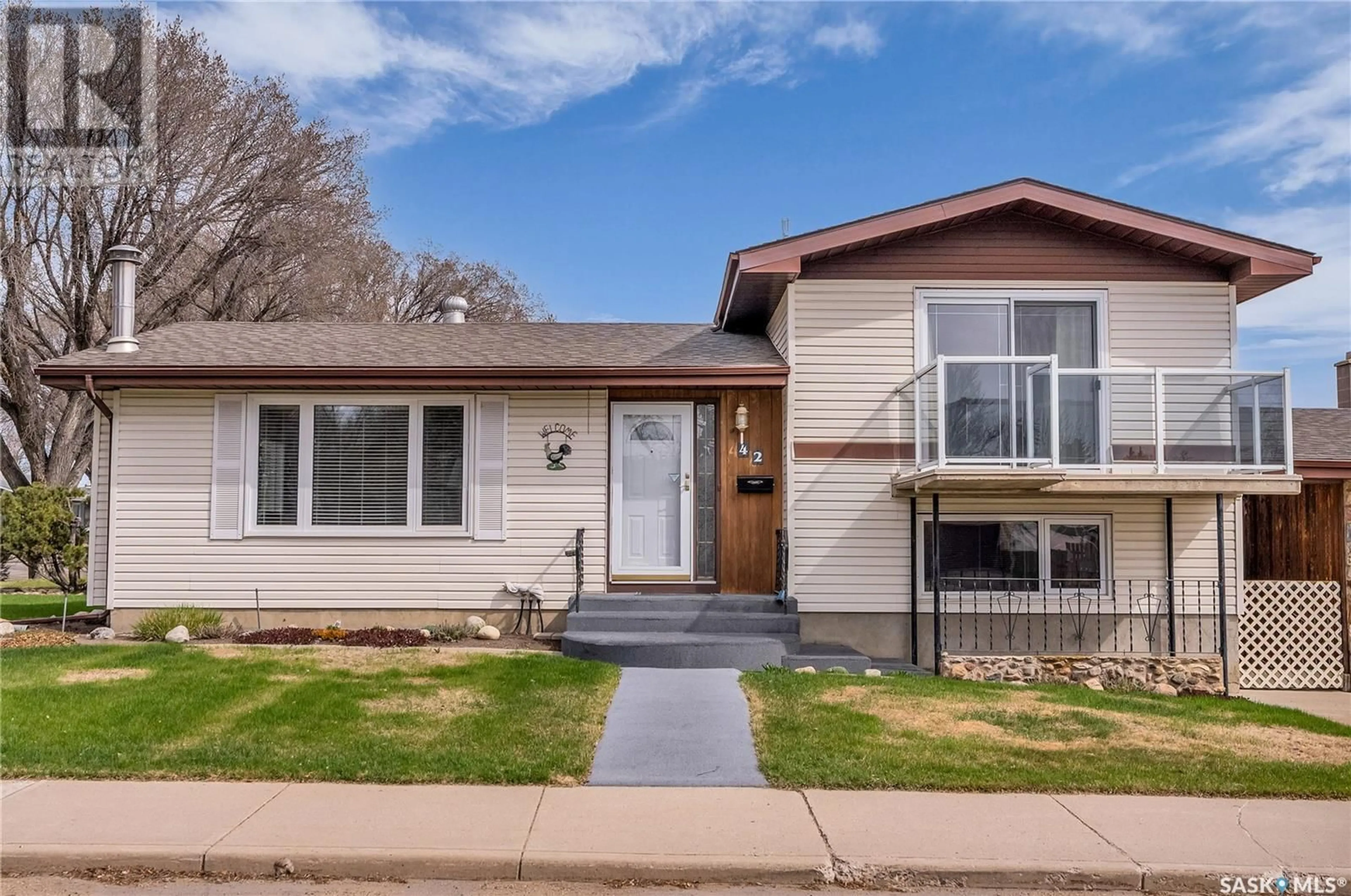 Home with vinyl exterior material, street for 42 RUPERT DRIVE, Saskatoon Saskatchewan S7K1B3