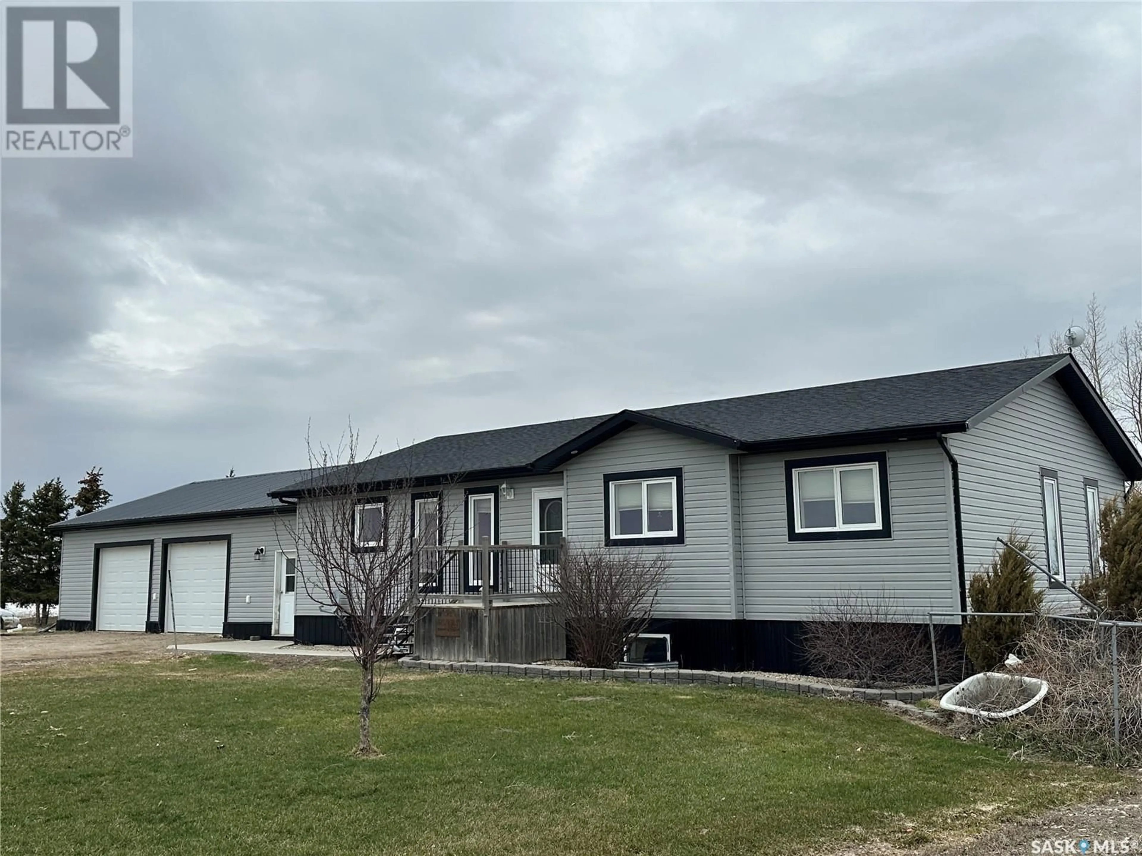 Home with vinyl exterior material, street for FRANCIS ACREAGE, Francis Rm No. 127 Saskatchewan S0G1V0