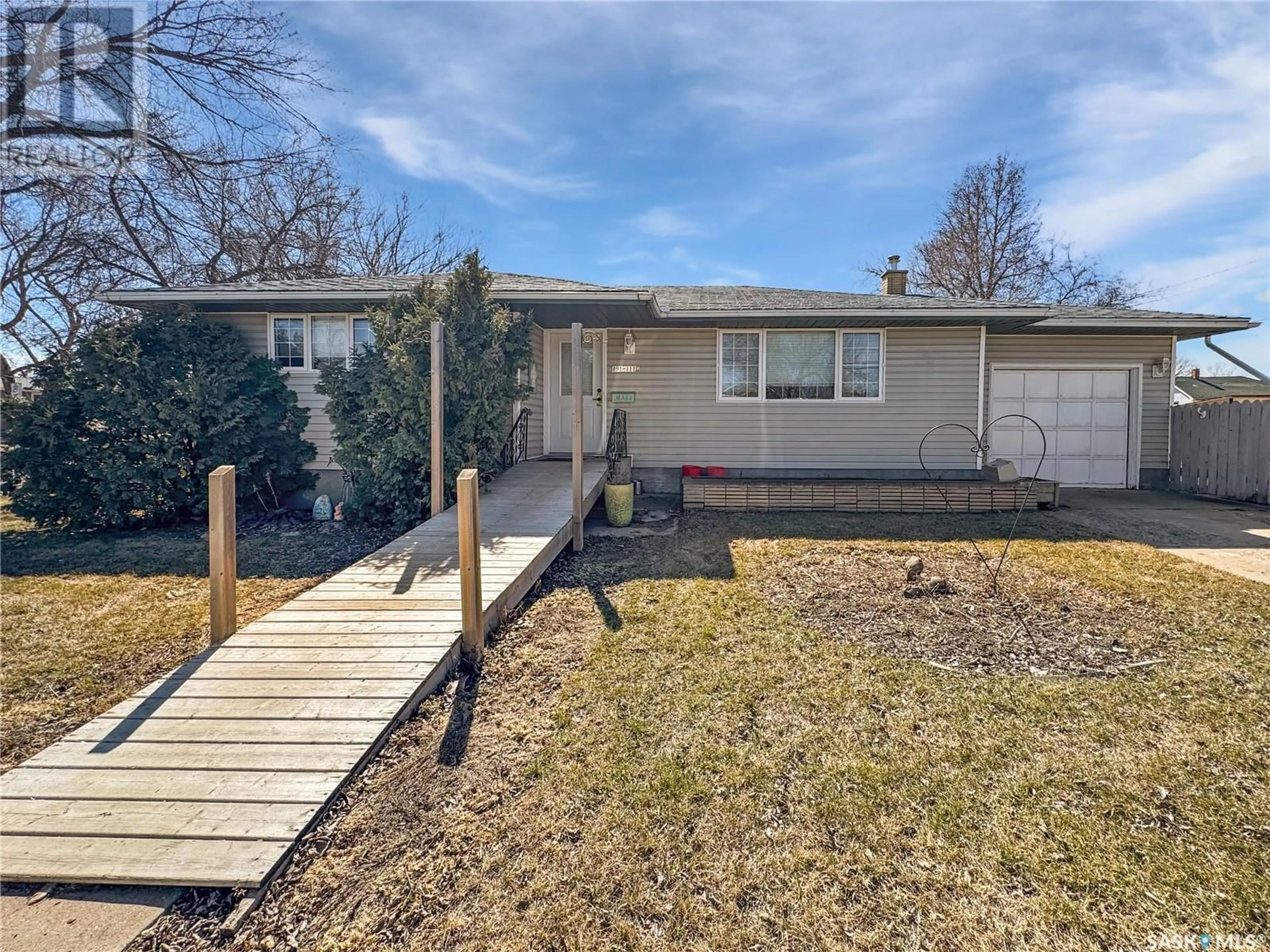 A pic from outside/outdoor area/front of a property/back of a property/a pic from drone, street for 891 111TH STREET, North Battleford Saskatchewan S9A2J9