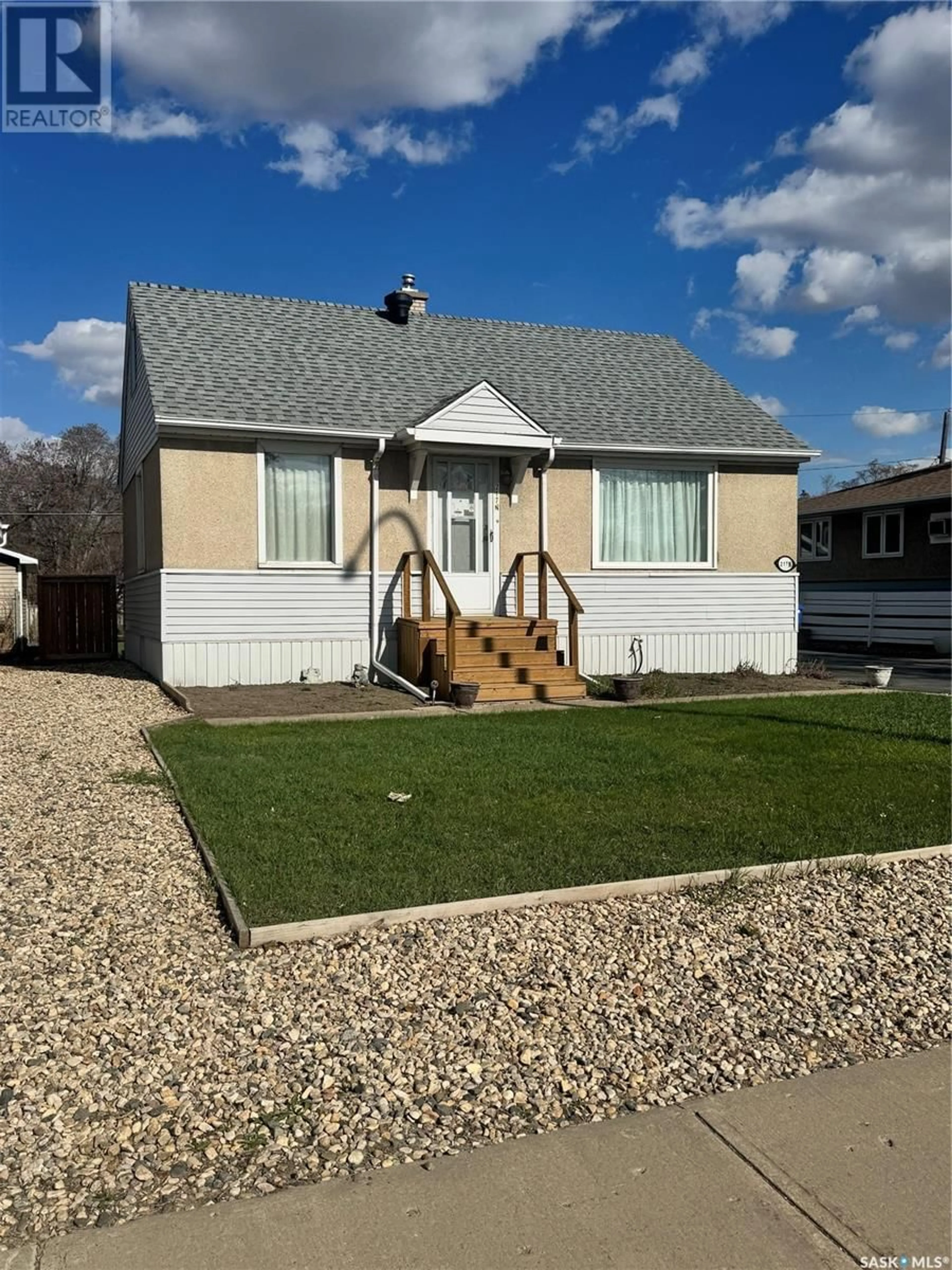 Home with vinyl exterior material, street for 217 BROAD STREET, Regina Saskatchewan S4R2X7