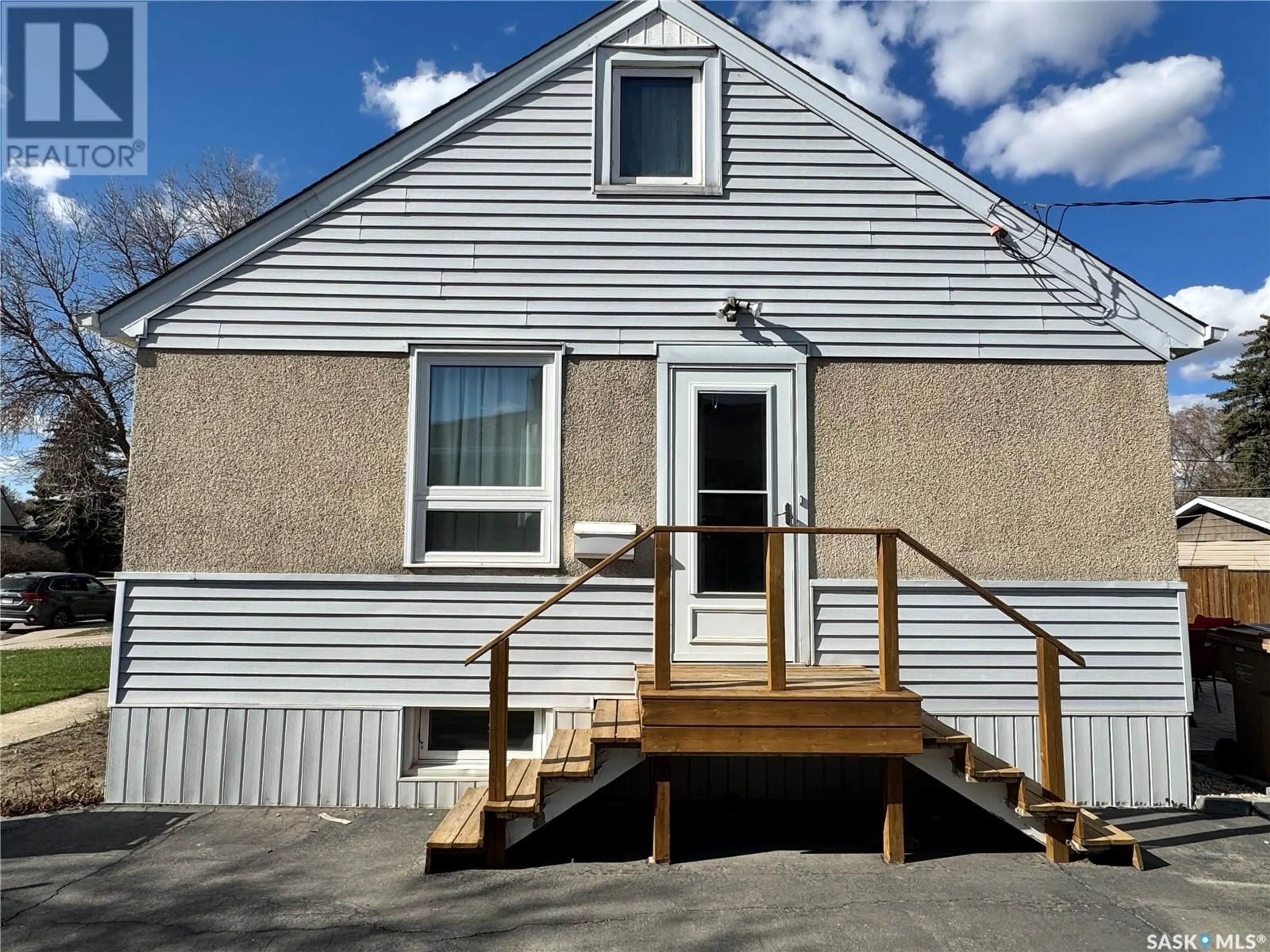 Home with vinyl exterior material, street for 217 BROAD STREET, Regina Saskatchewan S4R2X7