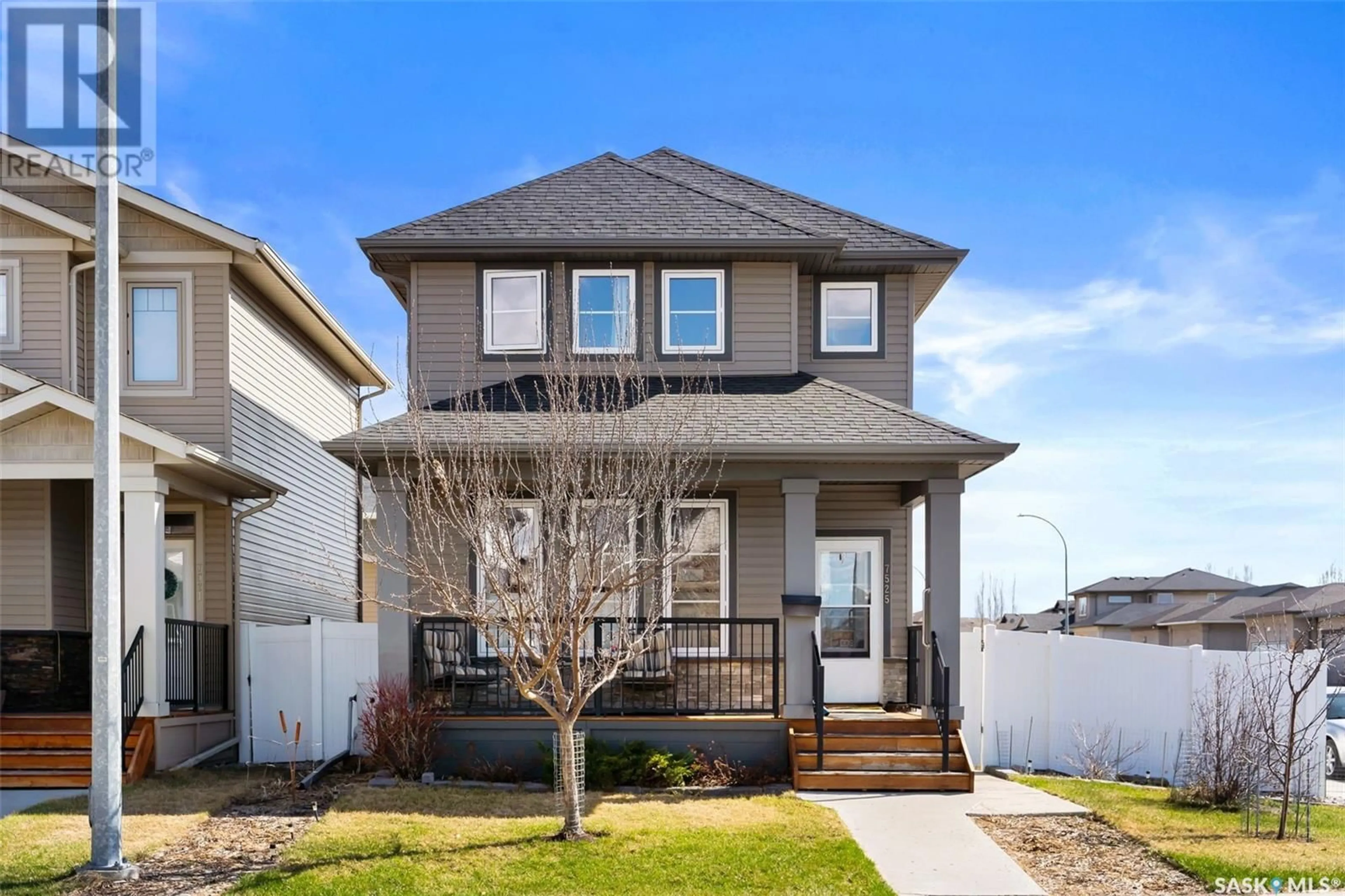Home with vinyl exterior material, street for 7525 OXBOW WAY, Regina Saskatchewan S4Y0B5