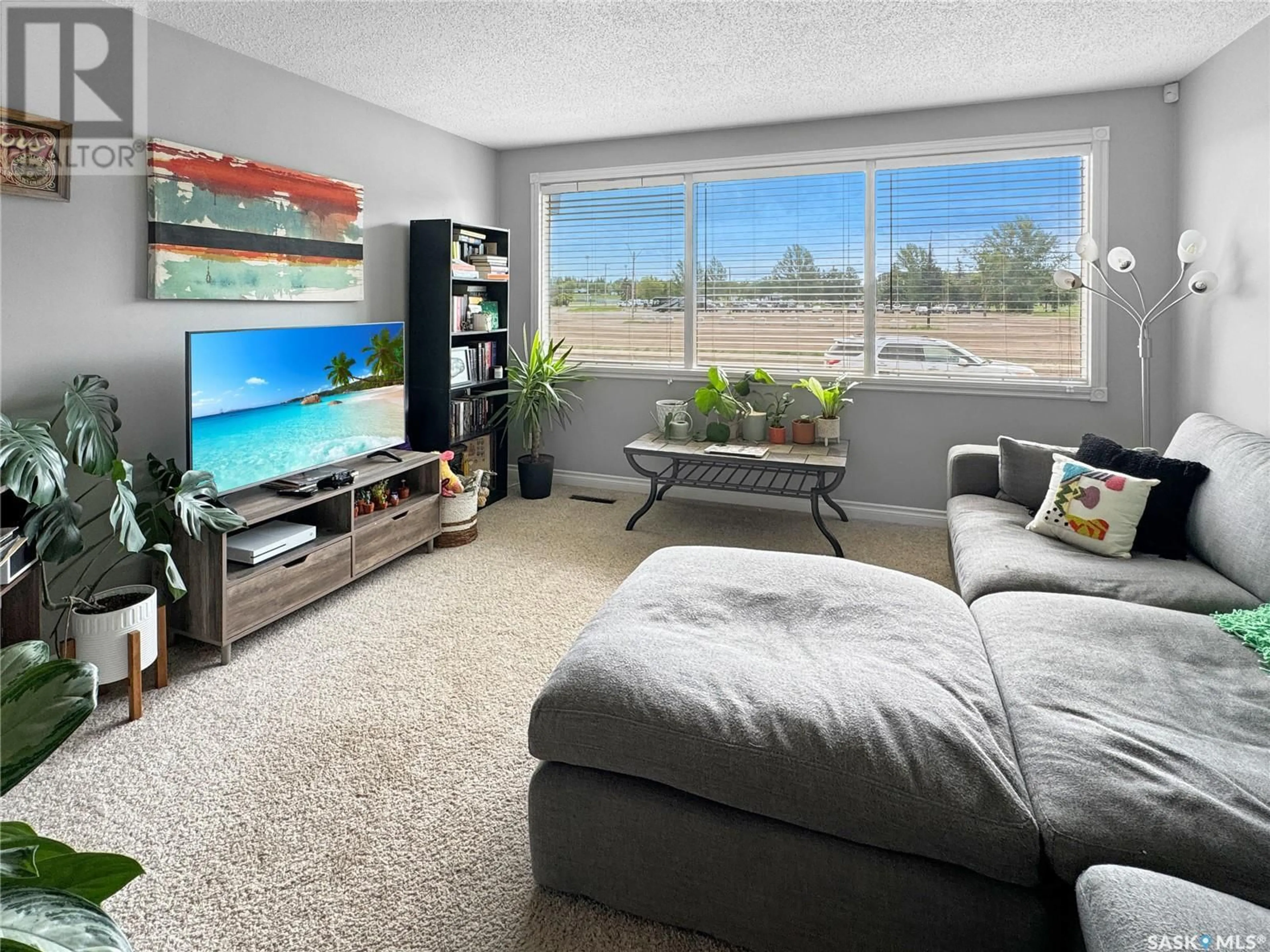 Living room with furniture, unknown for 1851 103RD STREET, North Battleford Saskatchewan S9A1M1
