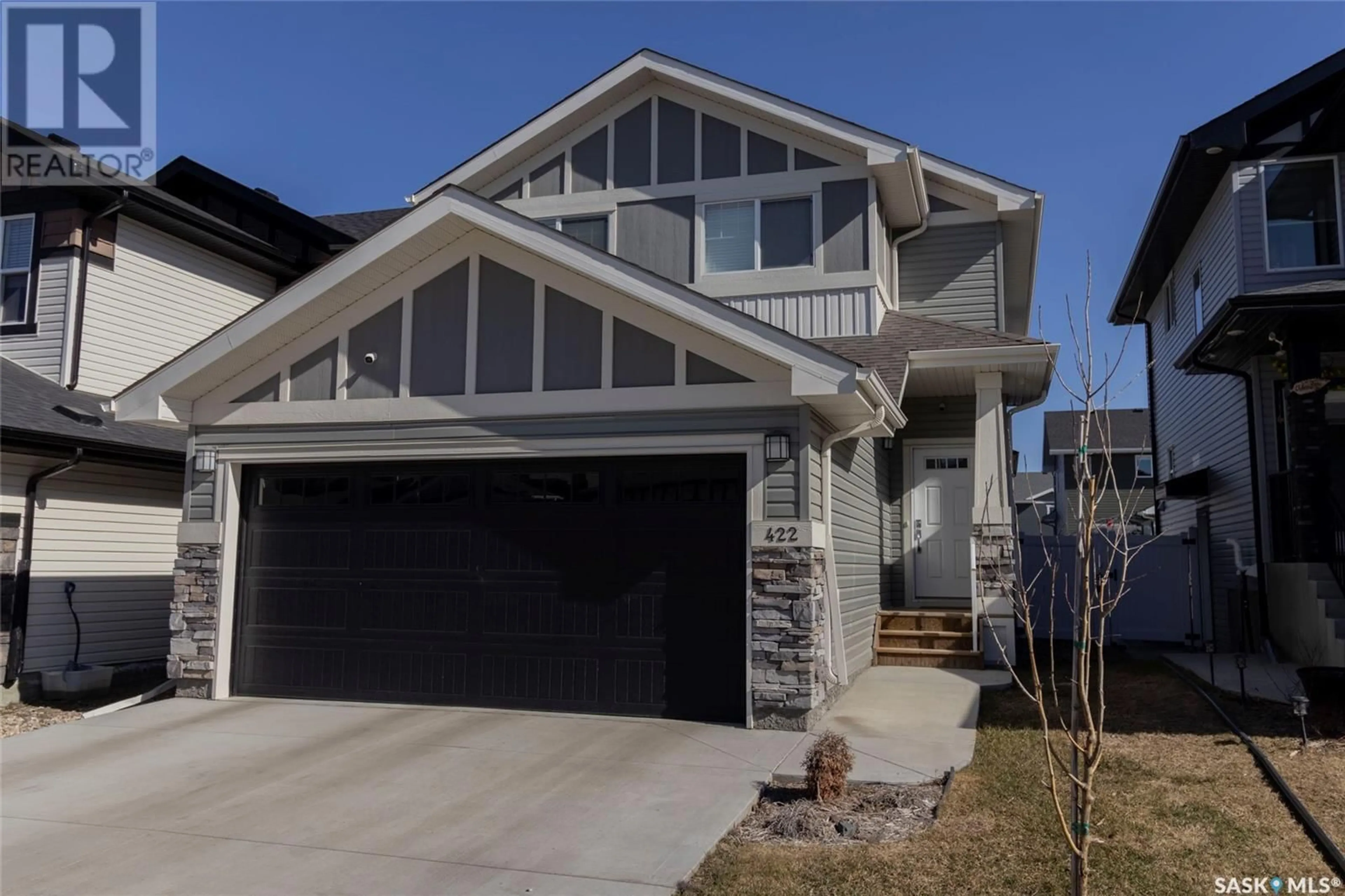 Home with vinyl exterior material, street for 422 MCFAULL CRESCENT, Saskatoon Saskatchewan S7V0T2