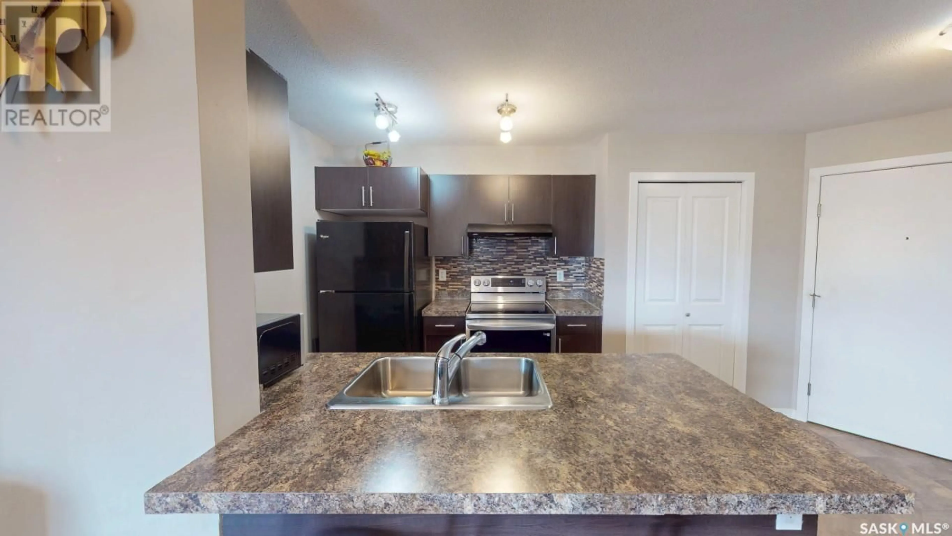 Open concept kitchen, unknown for 5500 - 1215 MITCHINSON WAY, Regina Saskatchewan S4W0N9