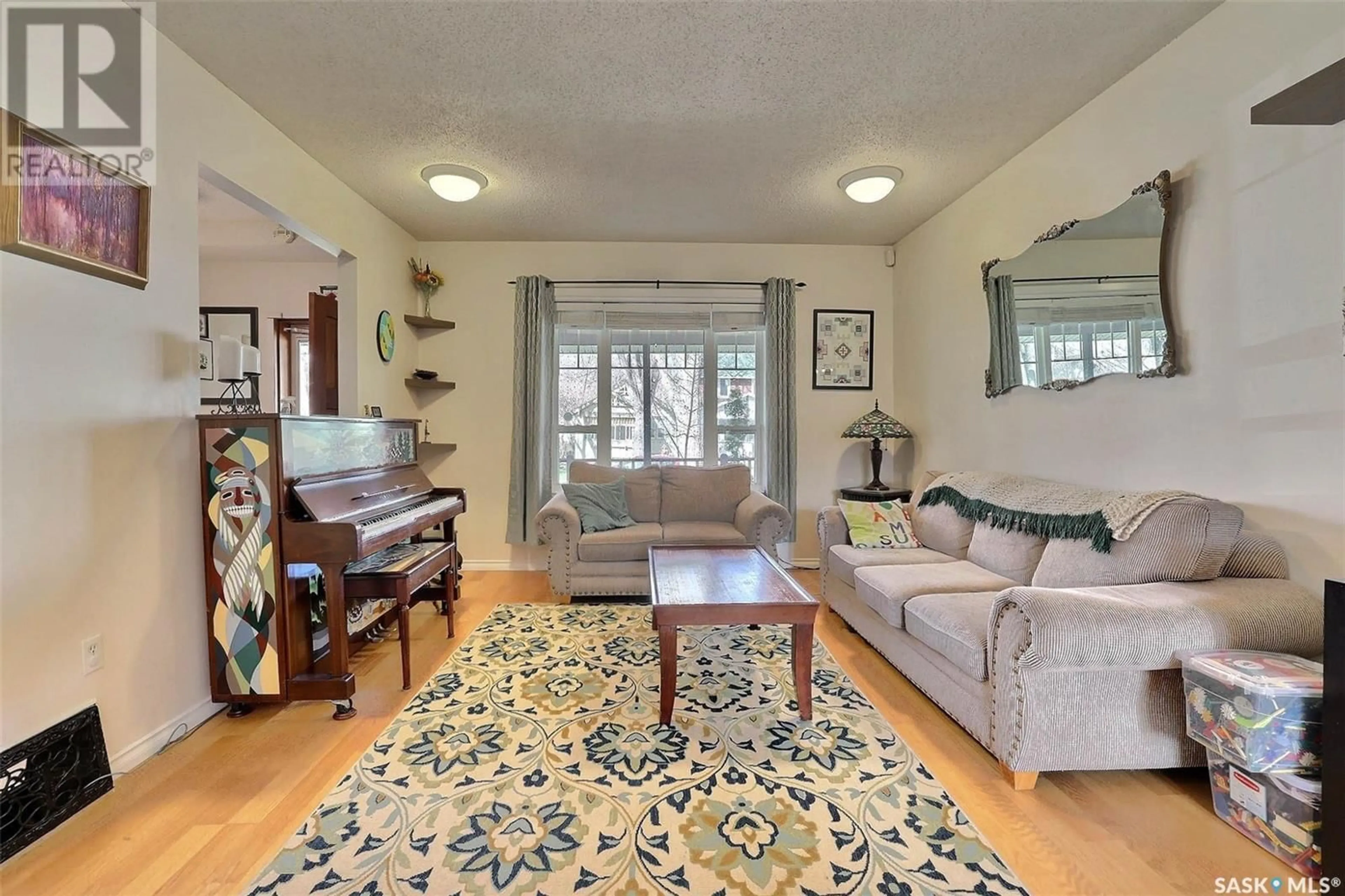 Living room with furniture, unknown for 2255 GARNET STREET, Regina Saskatchewan S4T3A1