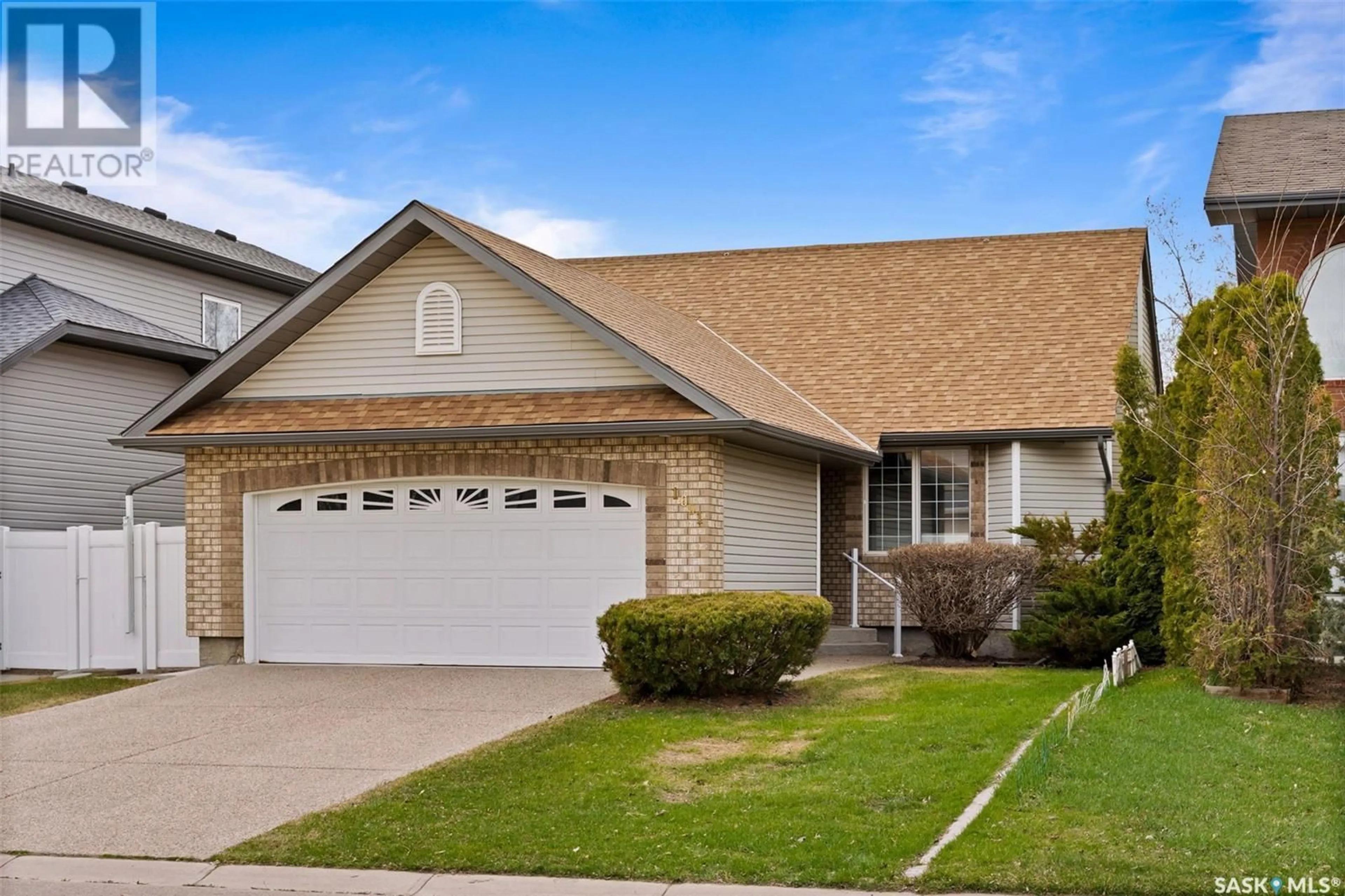 Home with vinyl exterior material, street for 1691 ROUSSEAU CRESCENT, Regina Saskatchewan S4X4L9