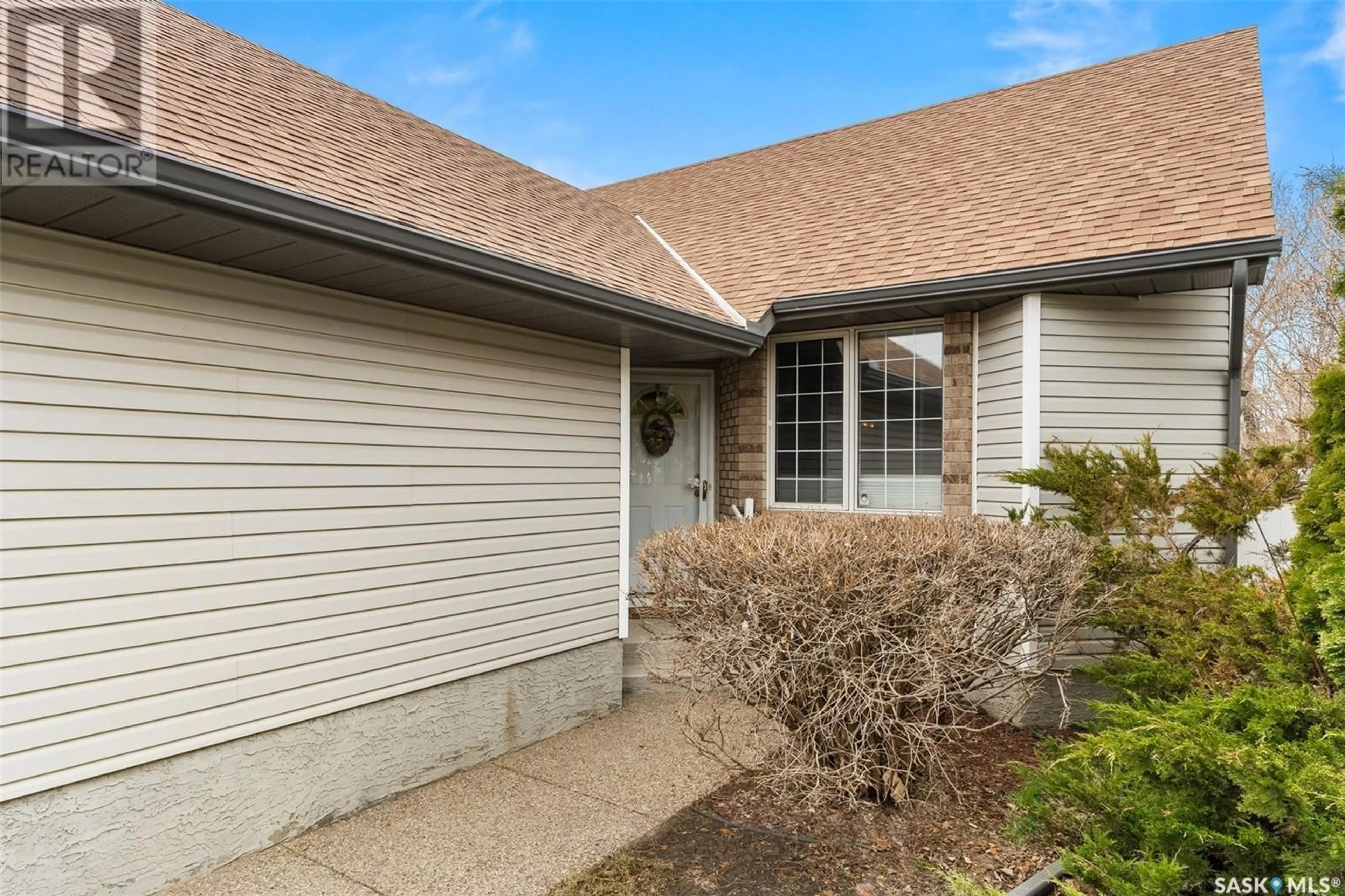 Home with vinyl exterior material, street for 1691 ROUSSEAU CRESCENT, Regina Saskatchewan S4X4L9