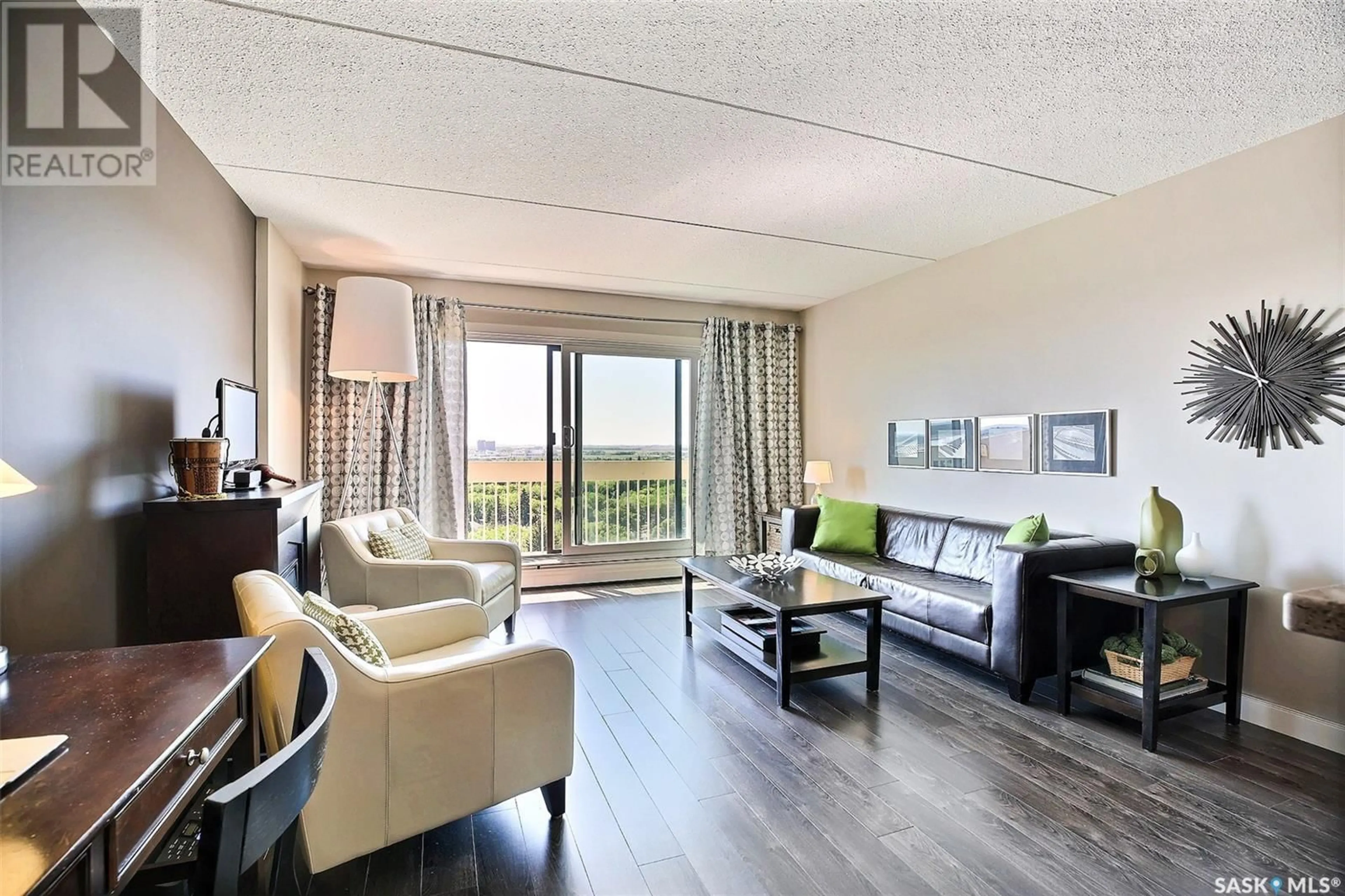 Living room with furniture, wood/laminate floor for 3520 - 1506 HILLSDALE STREET, Regina Saskatchewan S4S5Z5