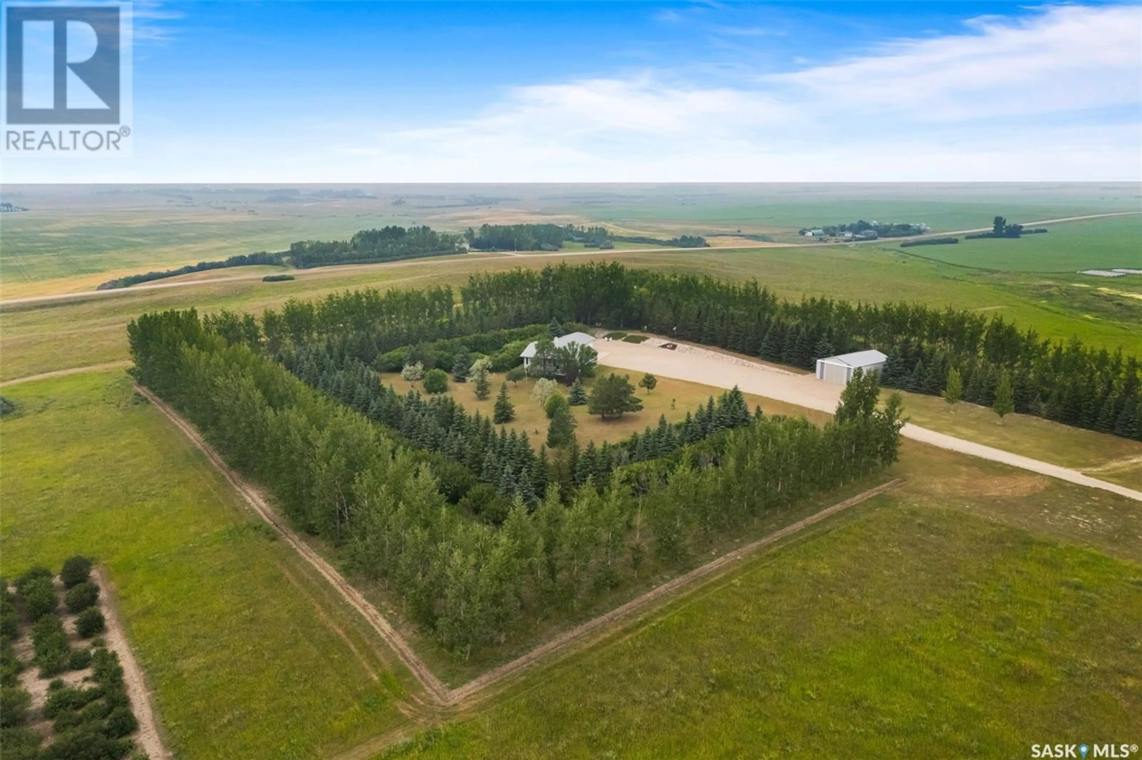 A pic from outside/outdoor area/front of a property/back of a property/a pic from drone, forest/trees view for PRAIRIE VIEW COMMUTER ACREAGE, Edenwold Rm No. 158 Saskatchewan S4L5B1