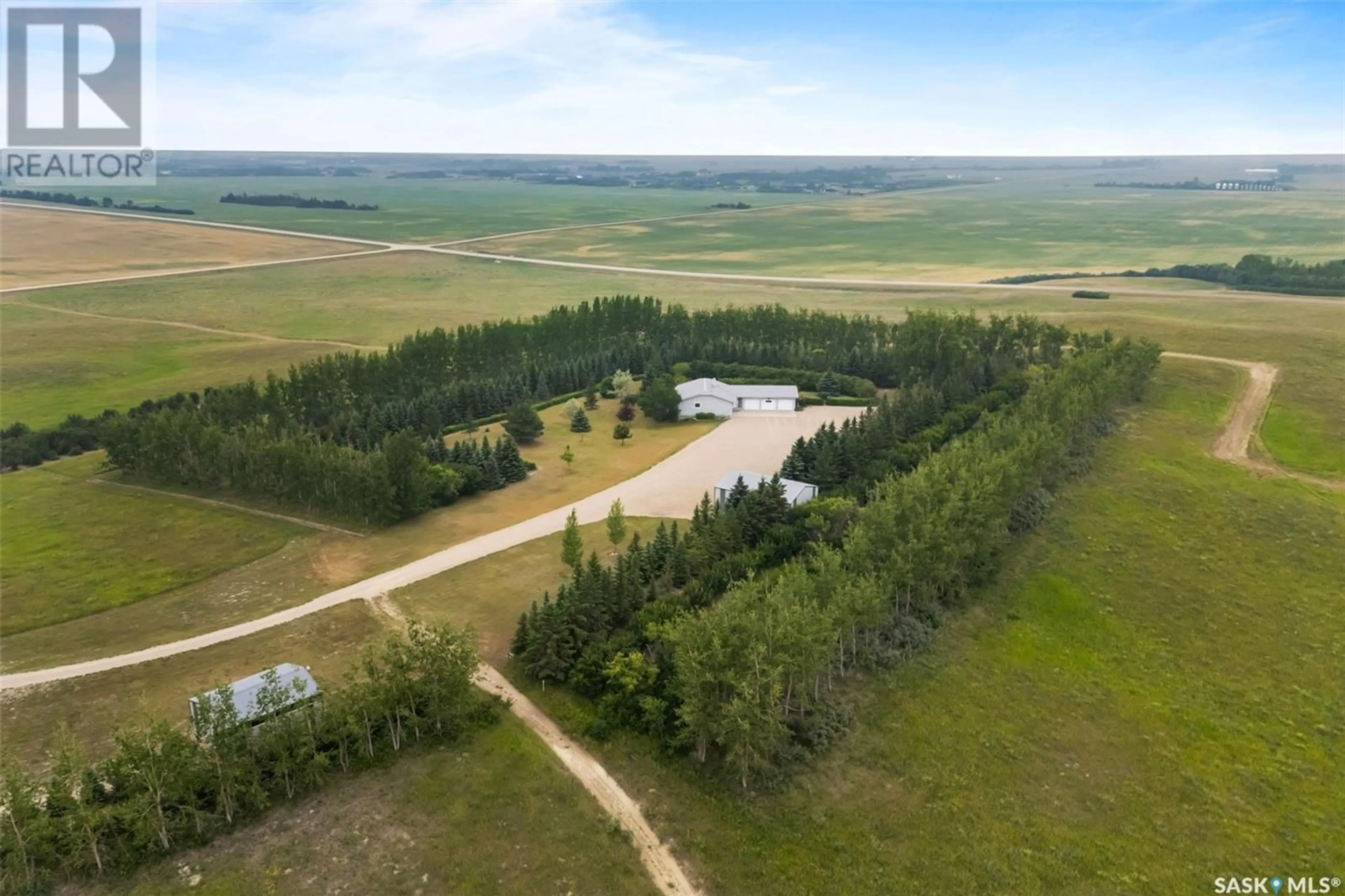 A pic from outside/outdoor area/front of a property/back of a property/a pic from drone, water/lake/river/ocean view for PRAIRIE VIEW COMMUTER ACREAGE, Edenwold Rm No. 158 Saskatchewan S4L5B1