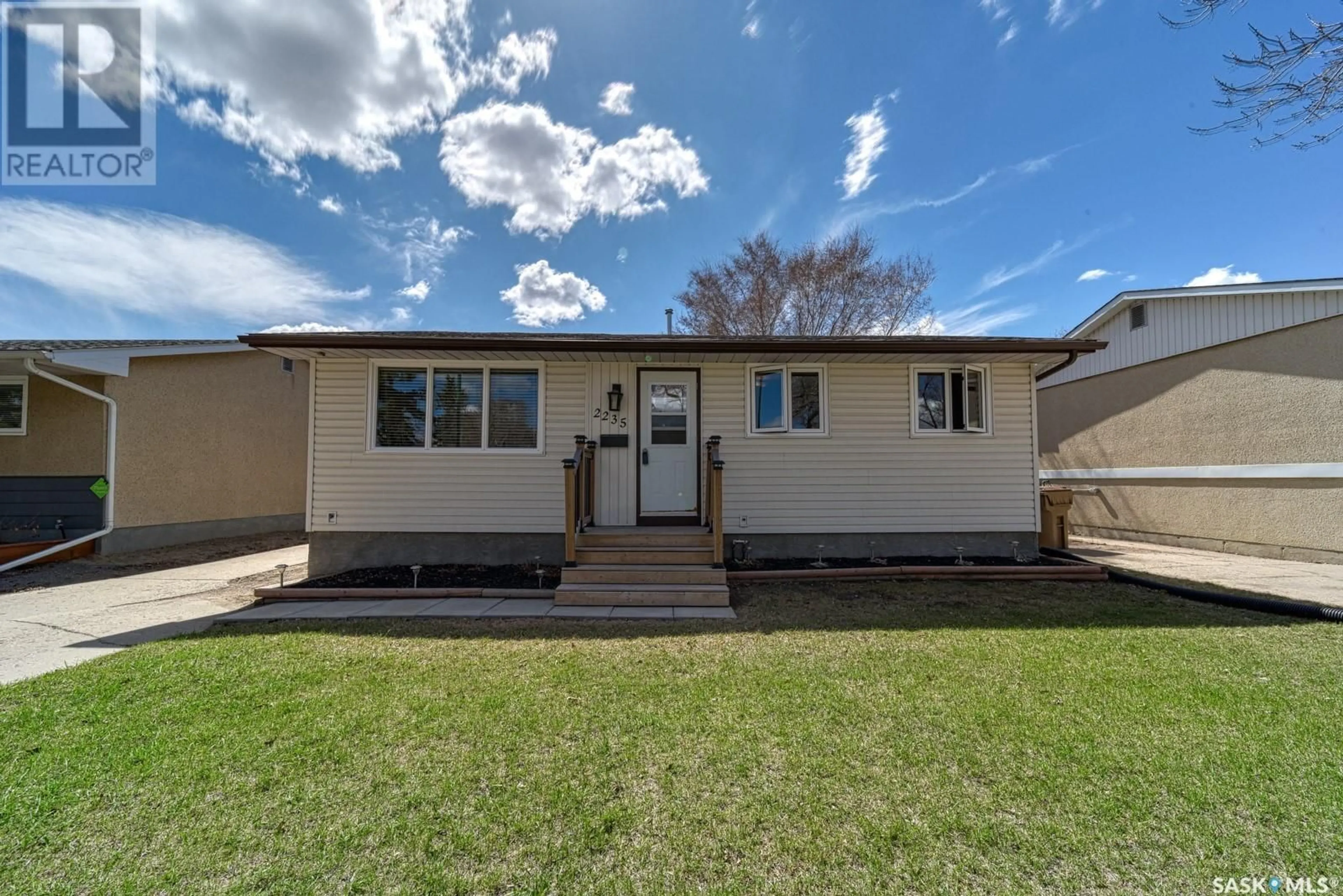 Home with vinyl exterior material, street for 2235 DEWDNEY AVENUE, Regina Saskatchewan S4N4C4
