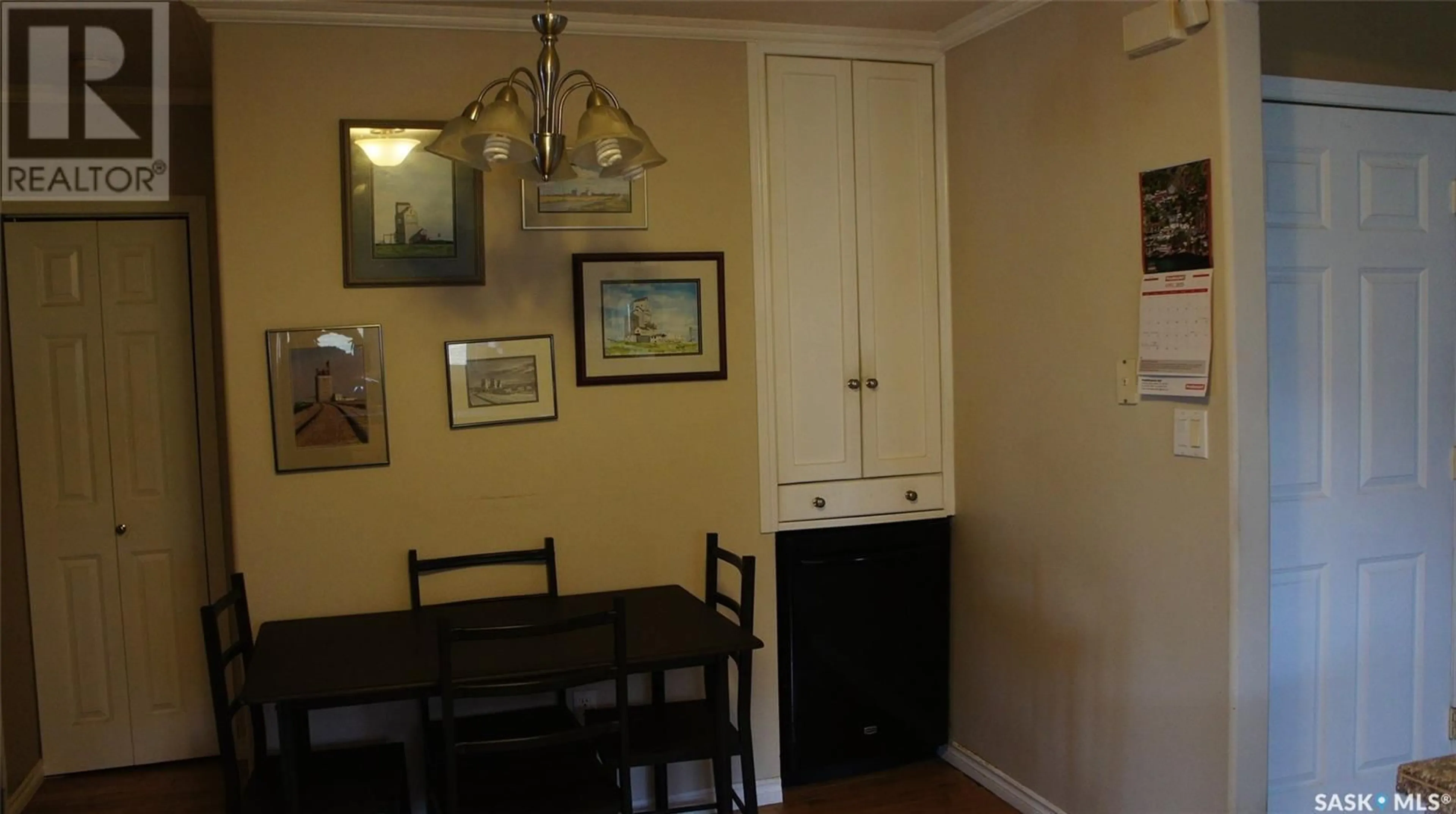 Dining room, wood/laminate floor for 805 1ST STREET, Estevan Saskatchewan S4A0G2